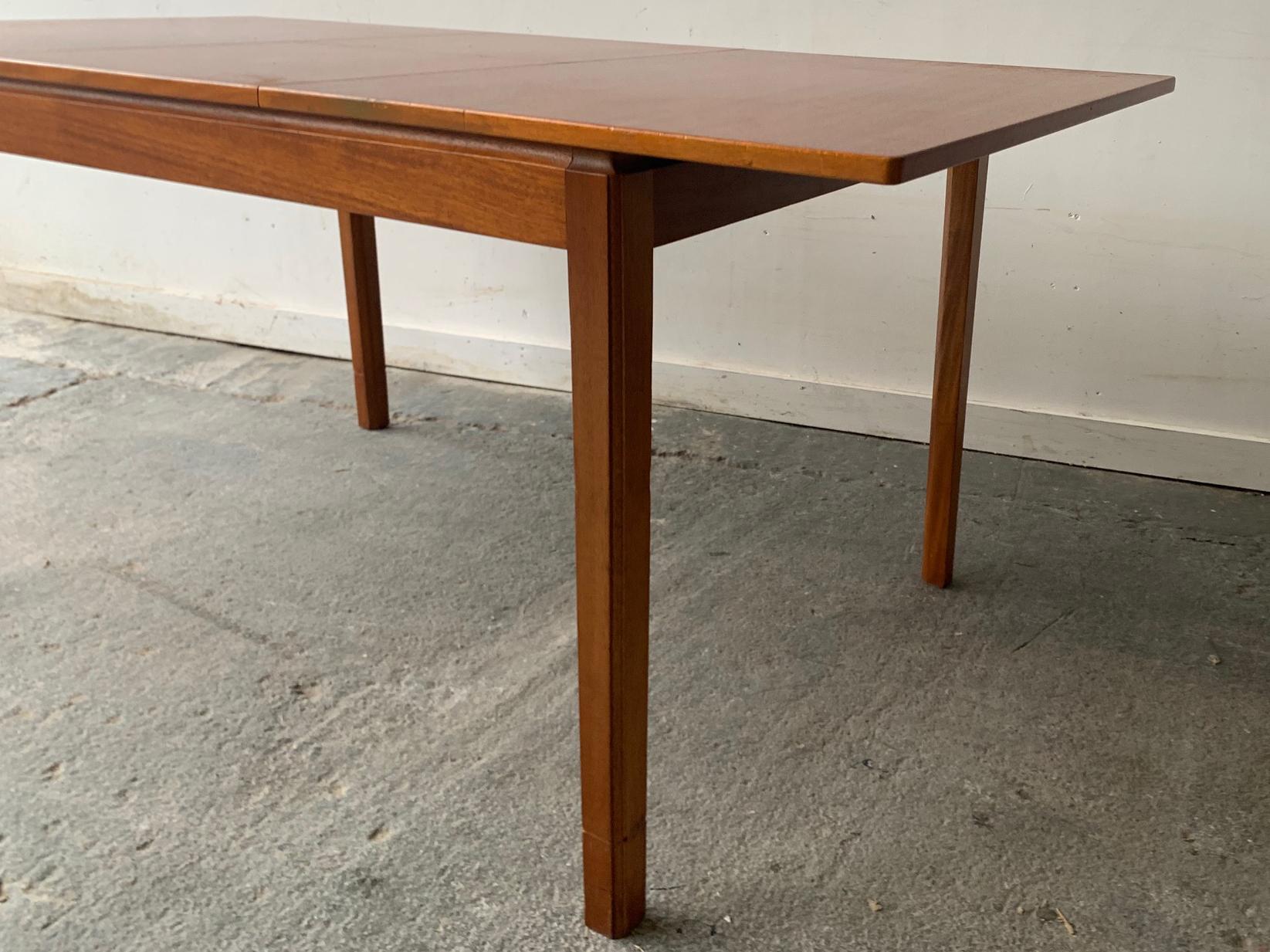 Teak Mid century 1960’s extending dining table by A.H.Mcintosh of Kirkcaldy For Sale