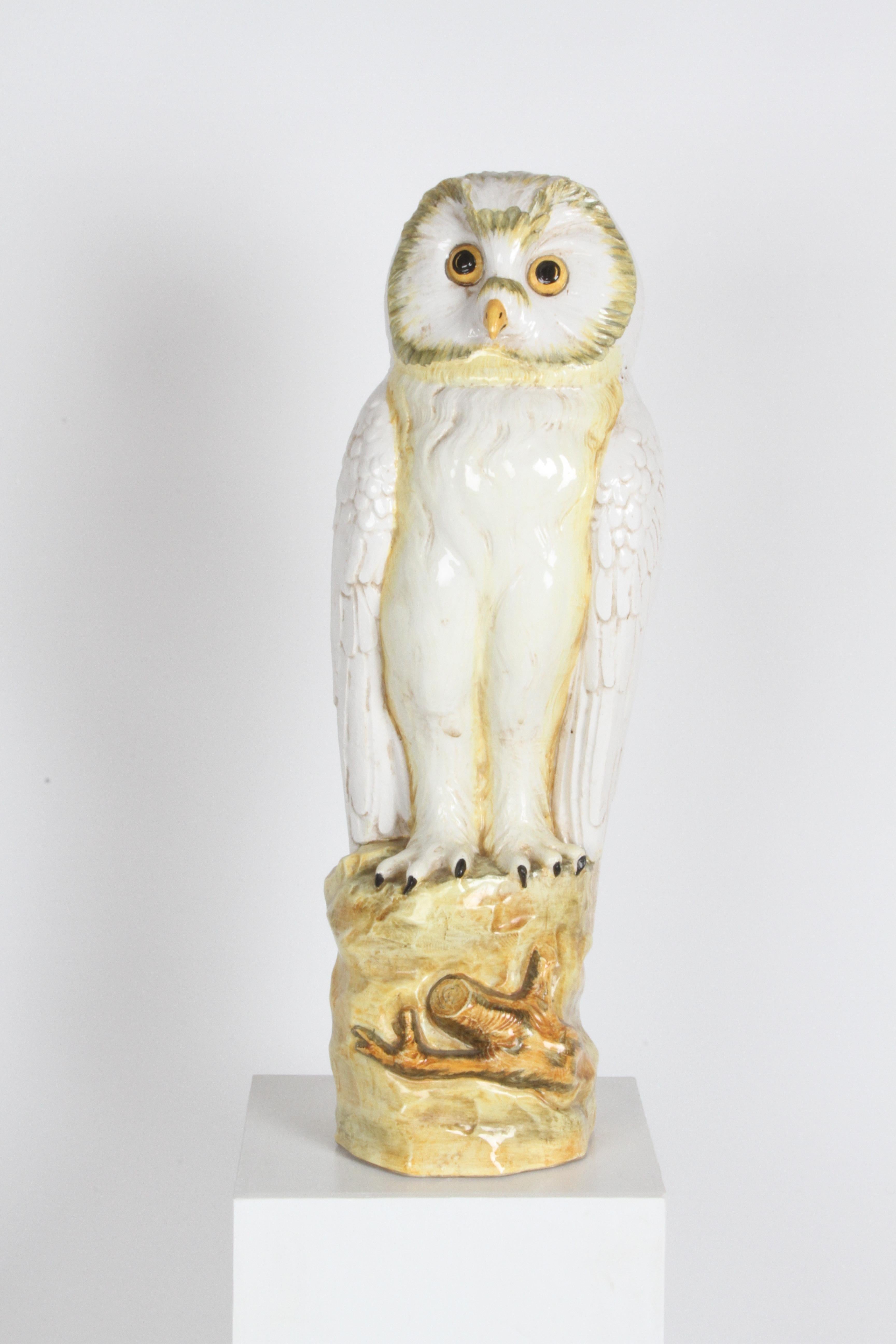 Large 1960s Italian Mid-Century majolica or maiolica glazed hand painted terracotta snow owl state or sculpture. Perched on a stump, colors include yellow , green , black and brown. No damage noted. Unmarked.  

