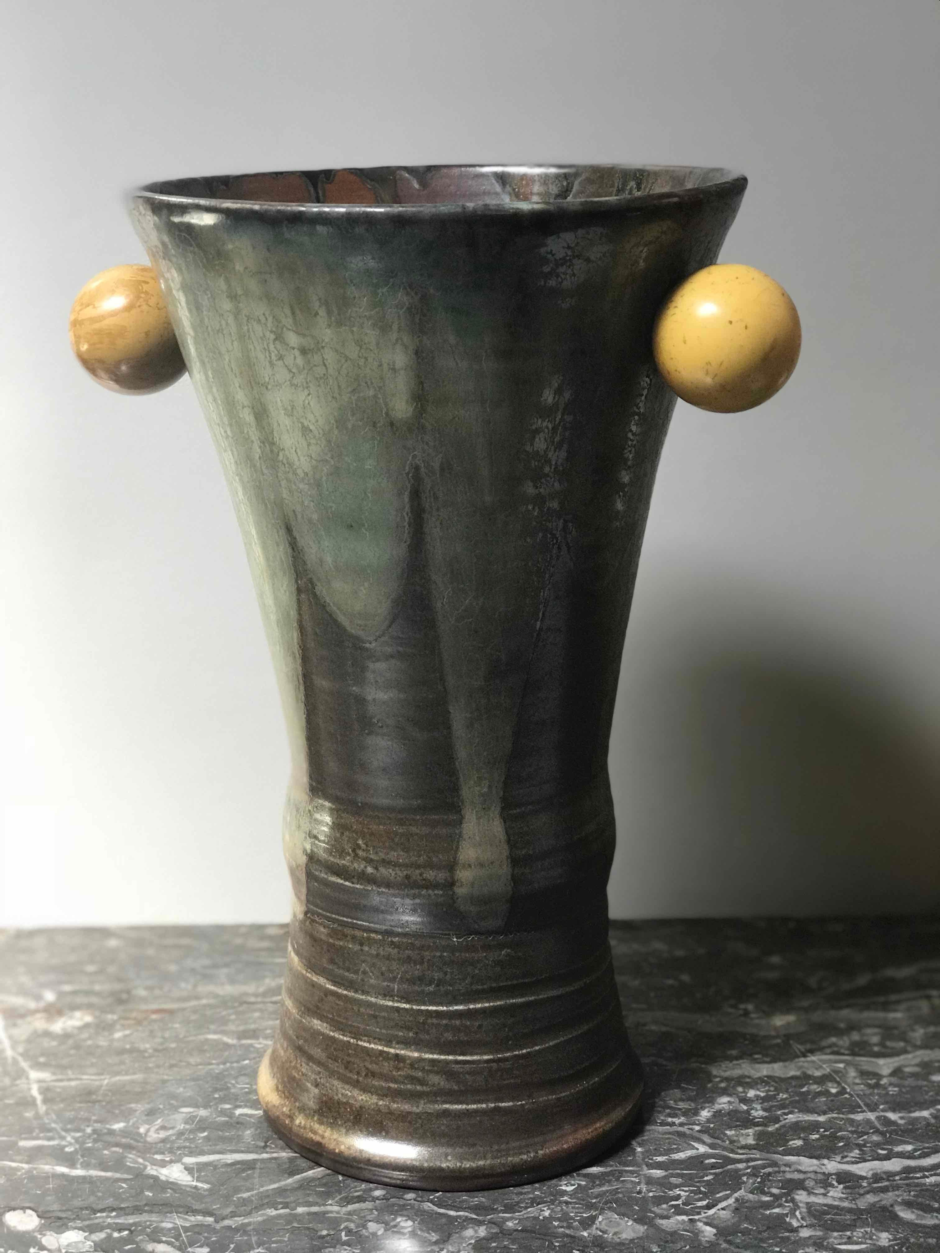 Mid-century 1960s large green vase with round handles from France. 
