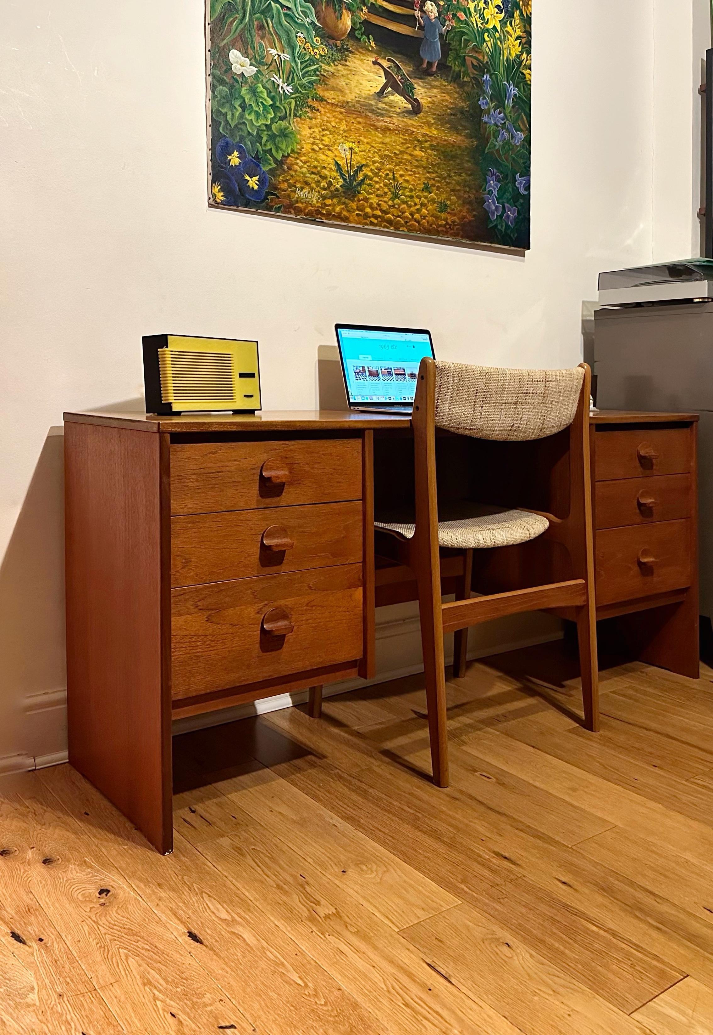 
Stunning Mid-century 1960’s teak desk by Stag. Three spacious drawers on each side with beautifully designed handles. Stunning design with gorgeous teak grain throuhout.
Very good vintage condition with some minor signs of use. 

Dimensions: