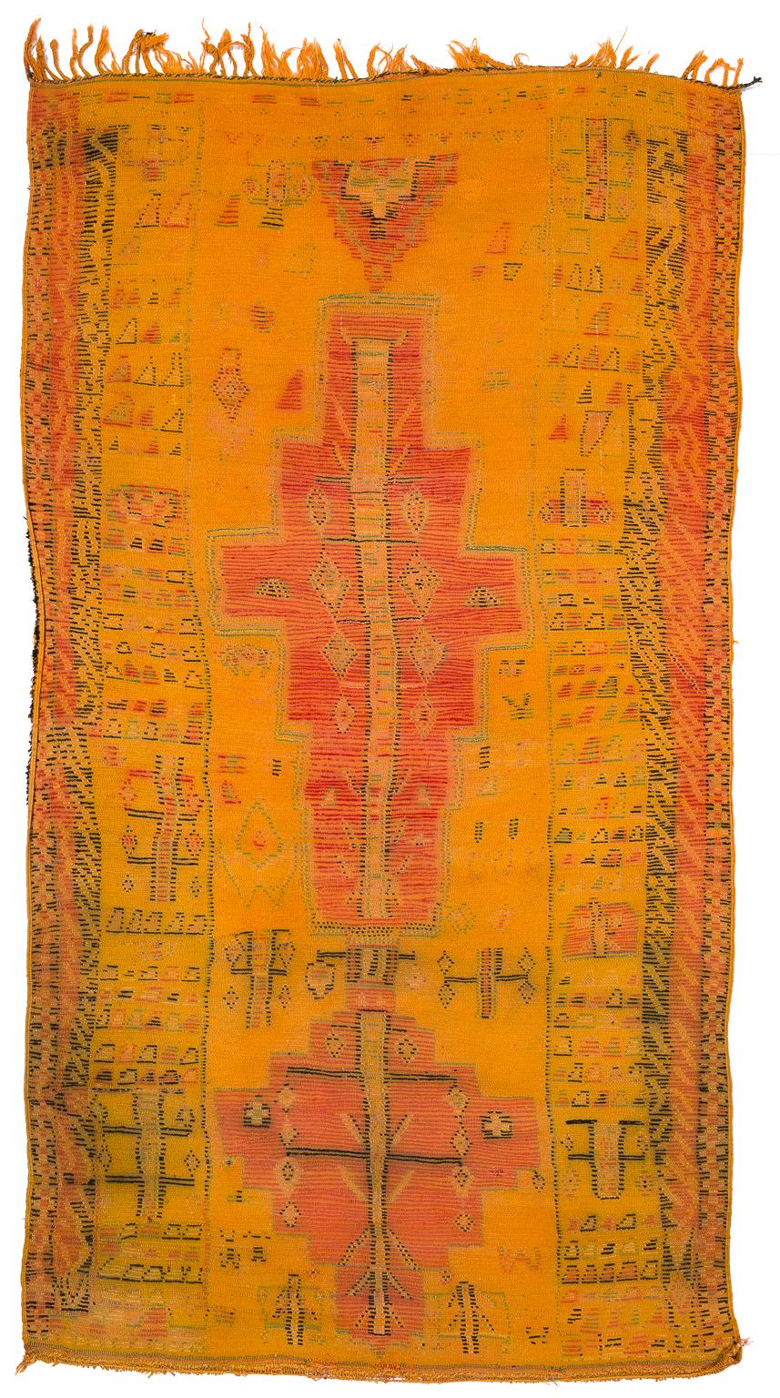 A highly unusual rug from the northern slopes of the High Atlas, south of Marrakech, made in the 1960s-1970s. It is a very rare kind of rug that somehow blends some of the qualities of the rugs from the Jebel Siroura region (such as good wool