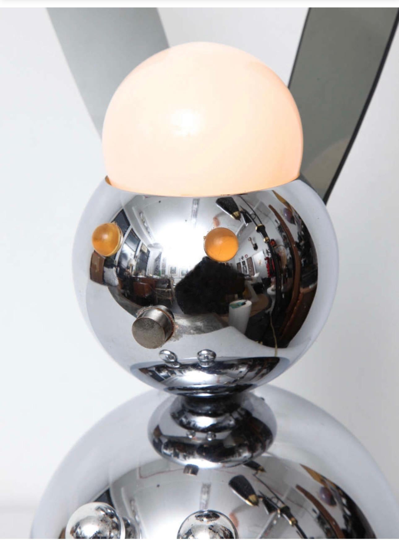 Mid Century 1970s Chrome RABBIT lamp. This Cute rabbit lamp is a bulbous shaped body with pointed smoked lucite ears.  Ears. a great playful look. Please make sure to look at our robot lamp in another listing. 17.25high x 7diameter