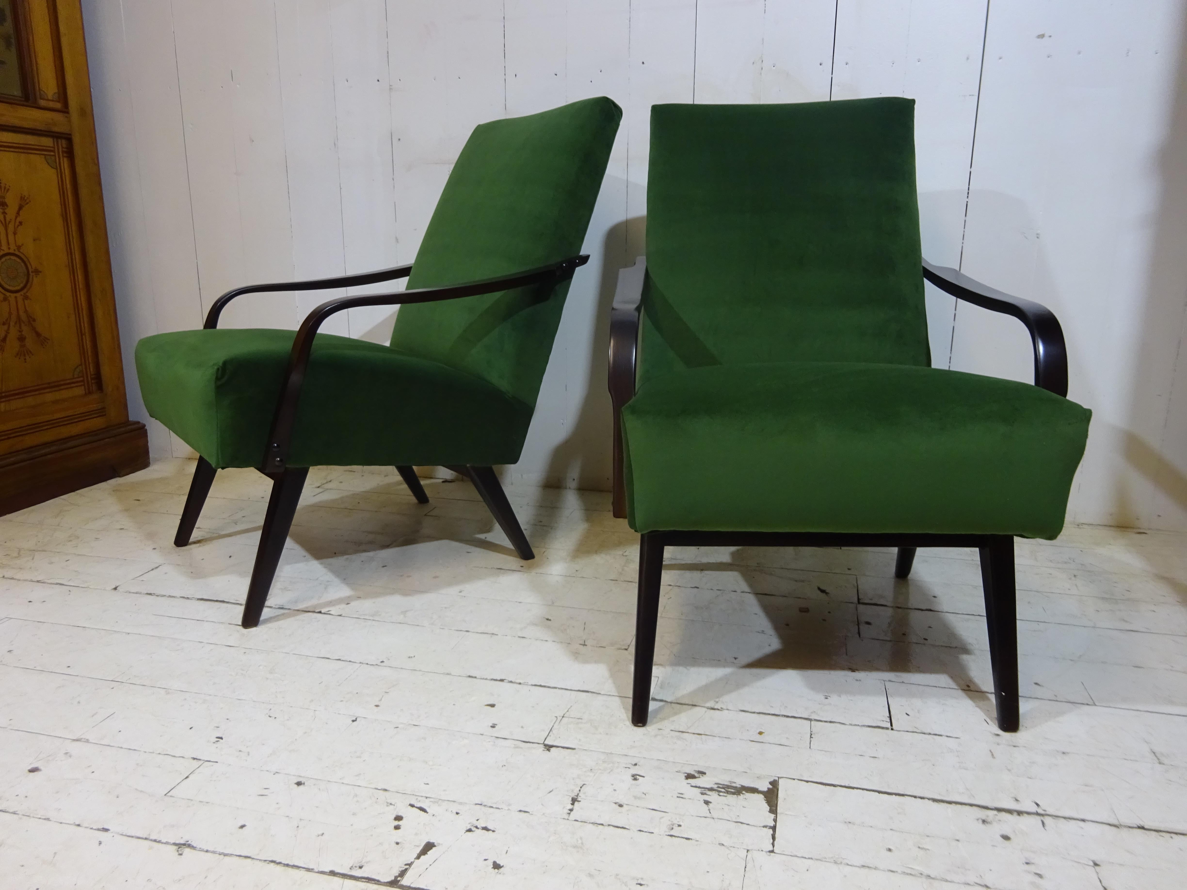A beautiful design by famous designer Jaroslav Smidekand manufactured by Jitona. Well made with beautiful shape these chairs look as cool as the day they were manufactured. Now becoming a rare find we have carefully restored the chair back to its