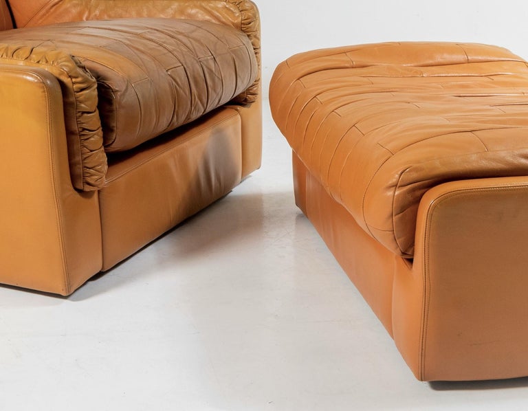 A 1970s designer piece by Gimson and Slater, England. Gimson and Slater were a company making high end contemporary sofas and chairs in the 1960s and 1970s. This Tan coloured patchwork leather is typical of their unique design of the late 60s early