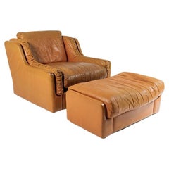 Fauteuil et repose-pieds en cuir brun clair patchwork du milieu des années 1970 par Gimson & Slater