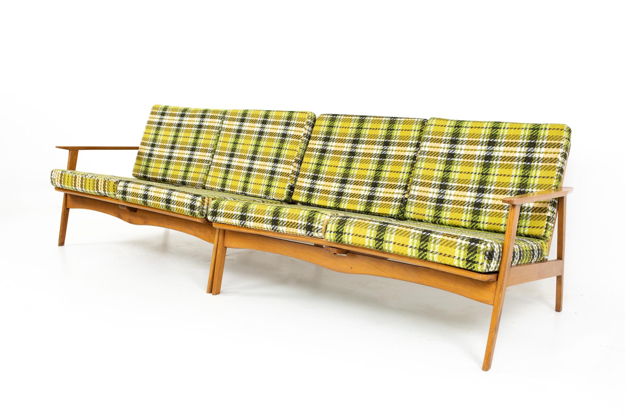 Mid century 2 piece wood framed sectional sofa with green plaid cushions
Sofa measures: 95 wide x 32 deep x 28.5 high, with a seat height of 15.5 inches

All pieces of furniture can be had in what we call restored vintage condition. That means