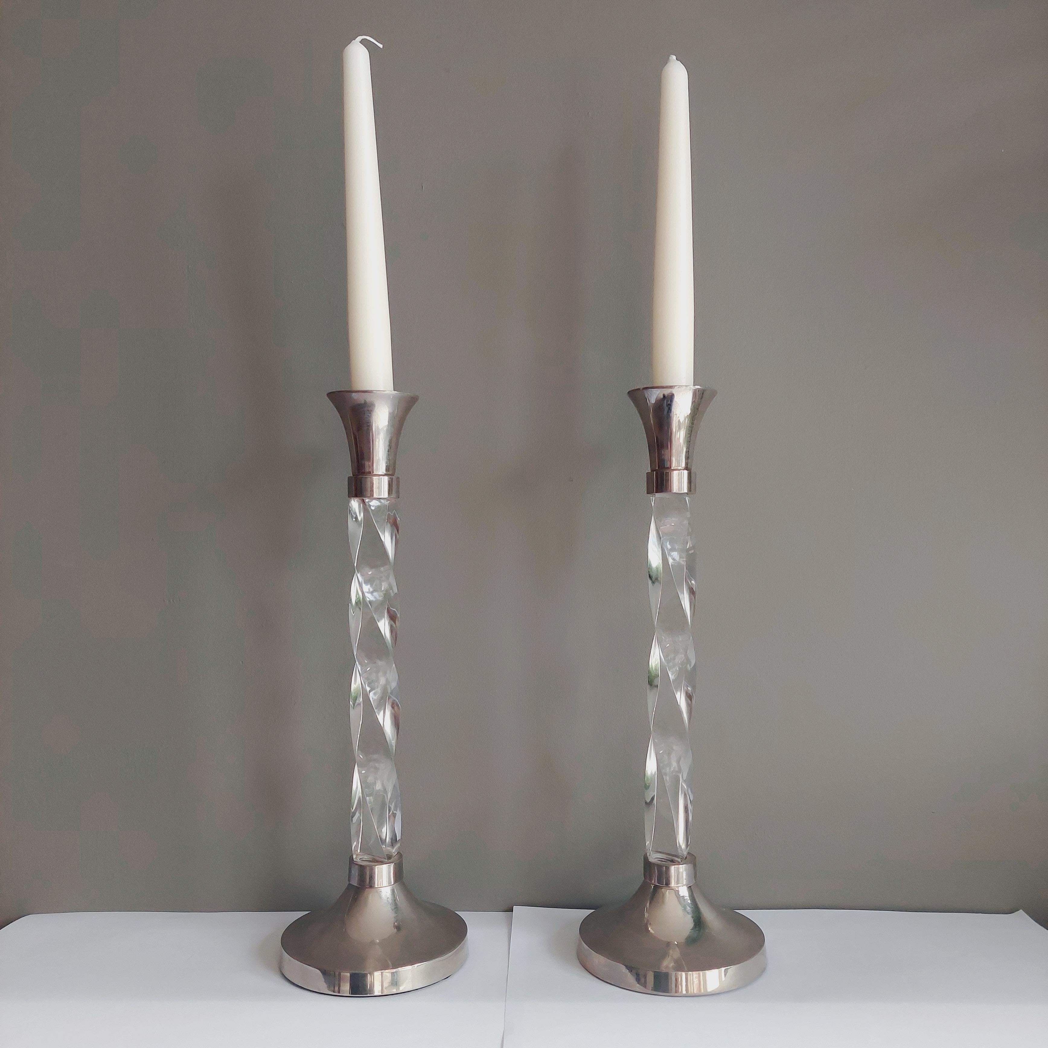 Pair of elegant 20th century stainless steel and Perspex candle sticks.
Beautiful vintage candlesticks in lucite and silver metal
Hollywood Regency / Contemporary candlesticks, with a chrome top and bottom, and awesome barley twist lucite acrylic