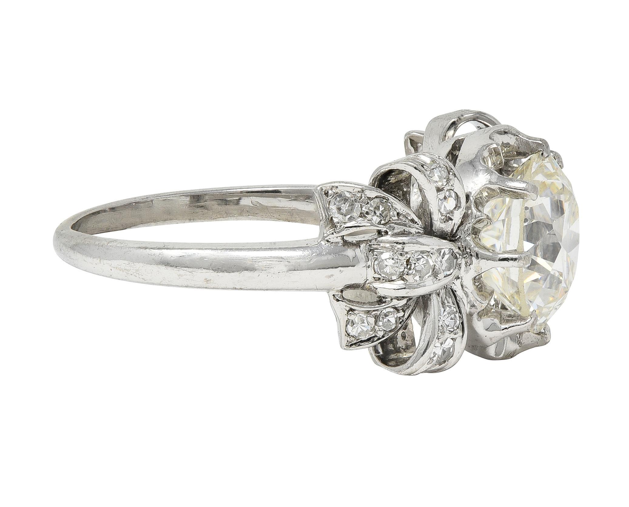 Mid-Century 2.00 CTW Diamond Platinum Vintage Bow Engagement Ring In Excellent Condition For Sale In Philadelphia, PA
