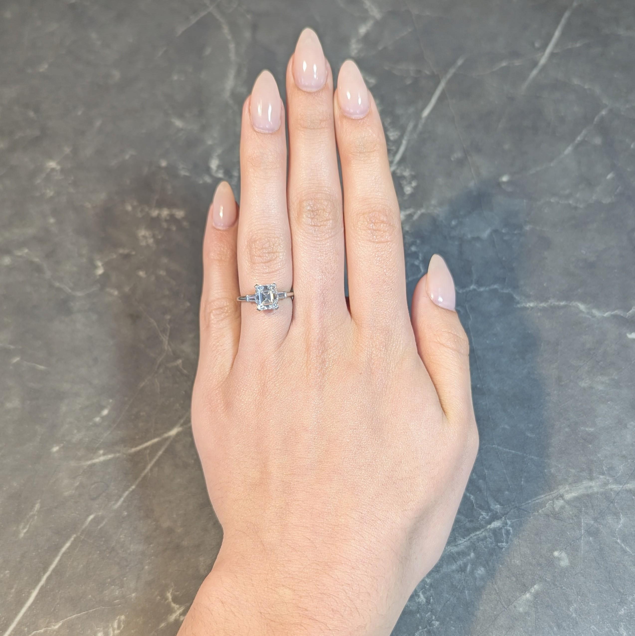 Mid-Century 2.17 CTW Emerald Cut Diamond Platinum Three Stone Engagement Ring For Sale 8