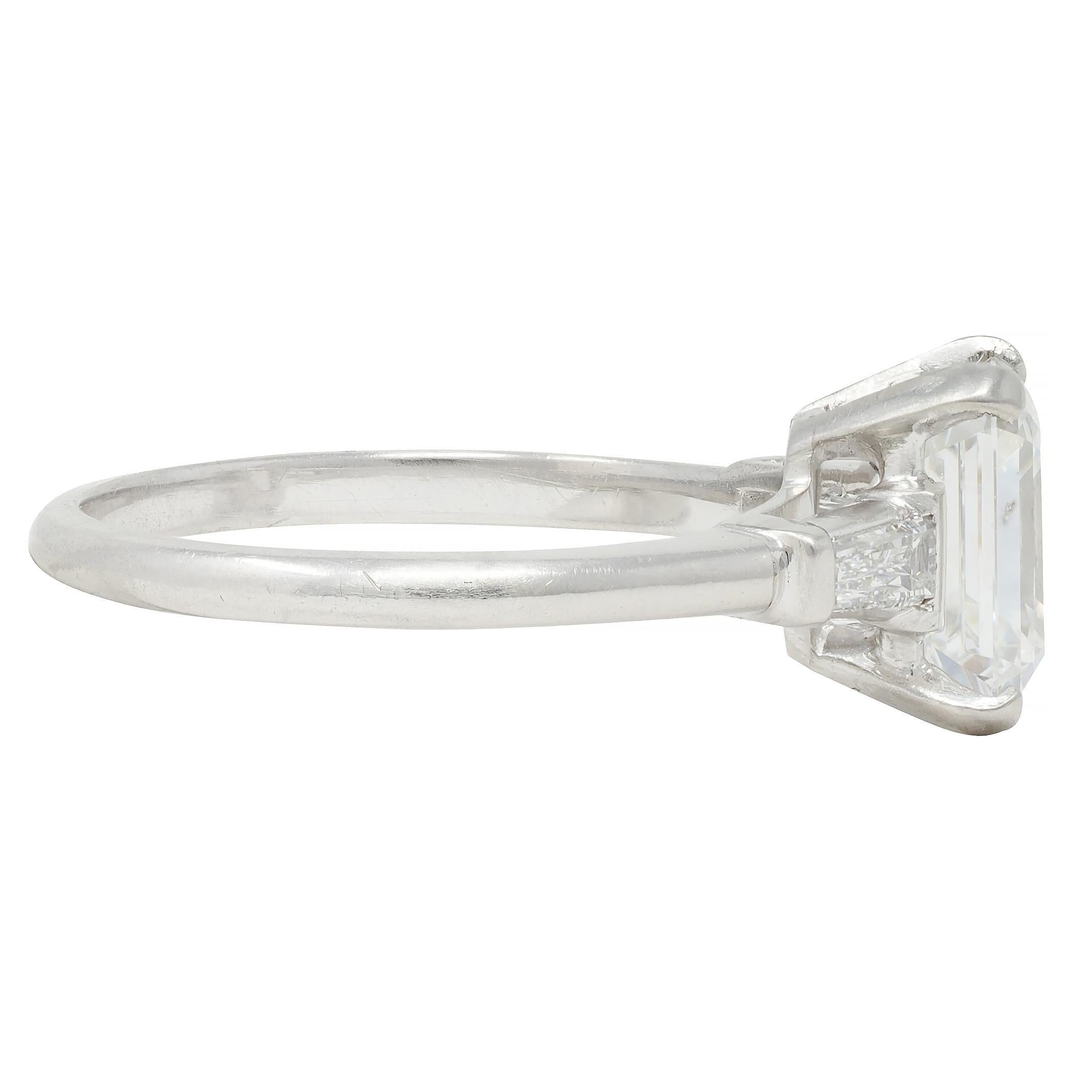 Mid-Century 2.17 CTW Emerald Cut Diamond Platinum Three Stone Engagement Ring In Excellent Condition For Sale In Philadelphia, PA