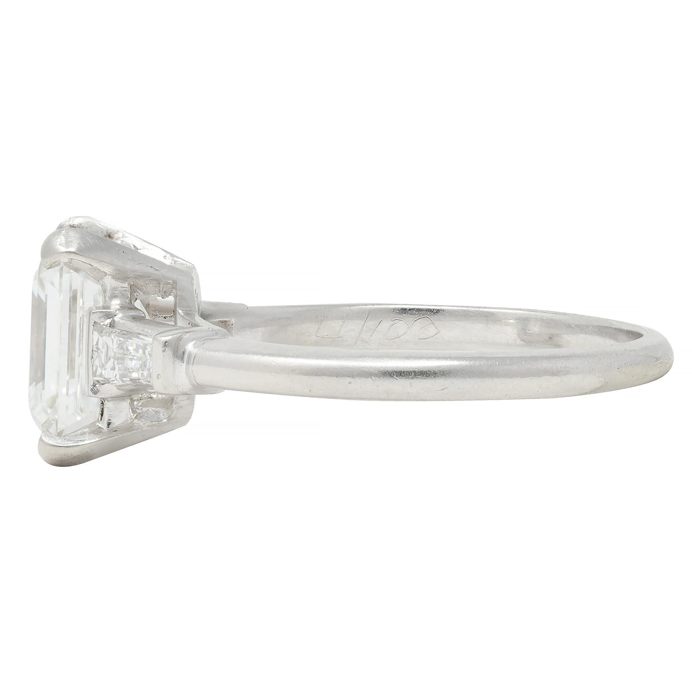 Mid-Century 2.17 CTW Emerald Cut Diamond Platinum Three Stone Engagement Ring For Sale 1