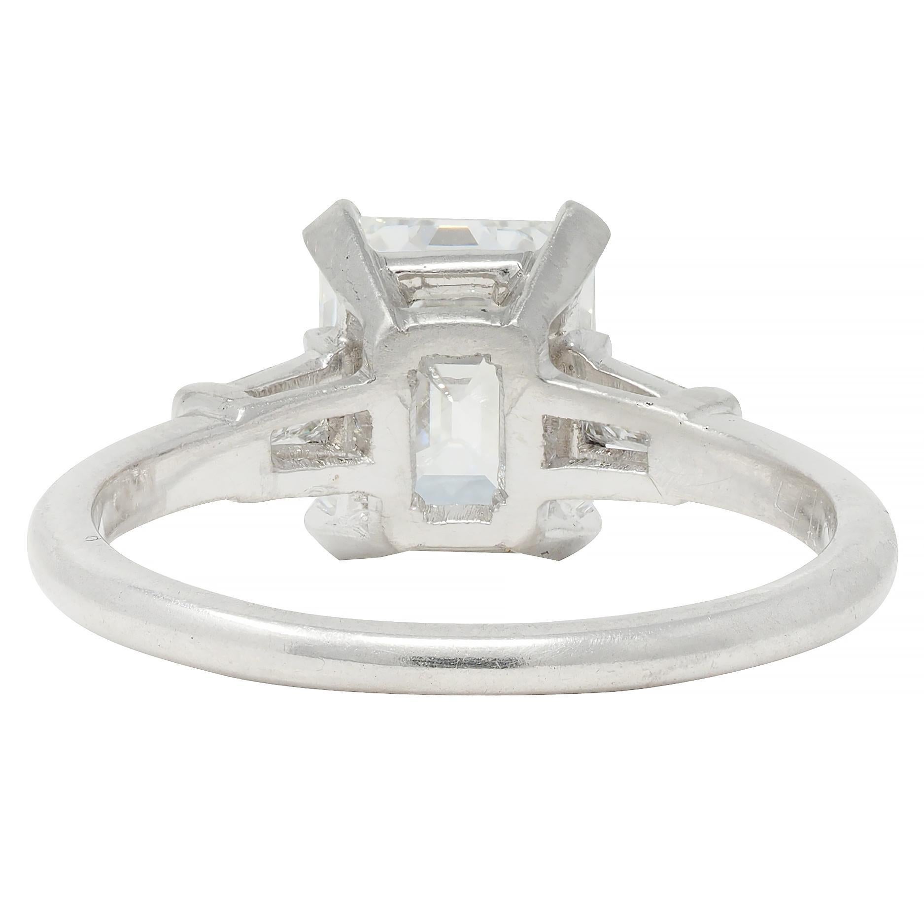 Women's or Men's Mid-Century 2.17 CTW Emerald Cut Diamond Platinum Three Stone Engagement Ring For Sale