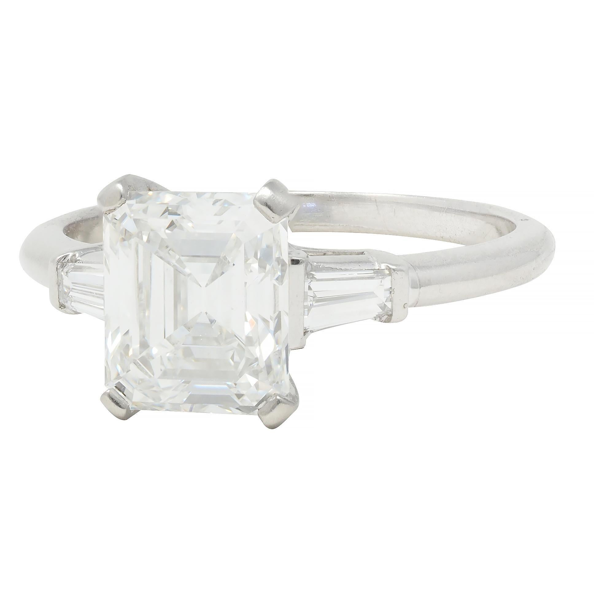 Mid-Century 2.17 CTW Emerald Cut Diamond Platinum Three Stone Engagement Ring For Sale 2