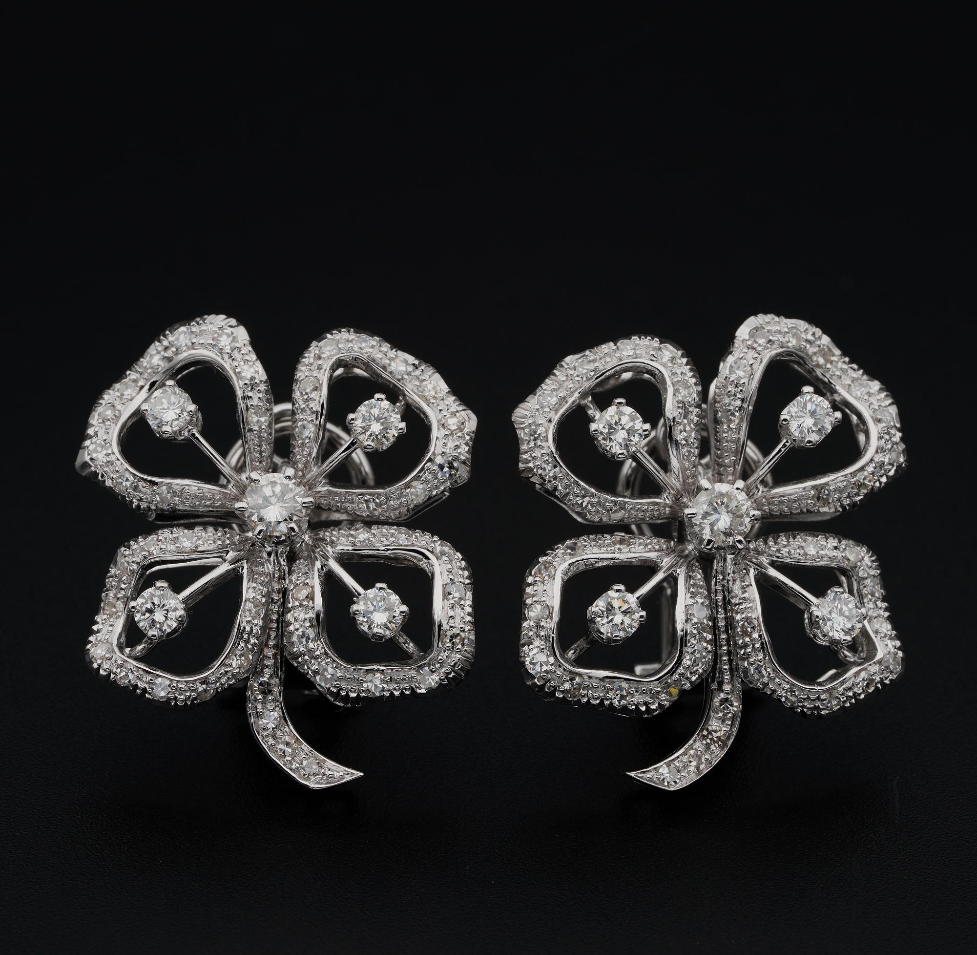 Classy of mid-century Diamond earrings, 1960 ca
Entirely hand crafted  as unique of solid 18 Kt white gold
Beautiful Pansy design overwhelmed by Diamonds
They hold 86 in number half cut Diamonds for 1.30 Ct and further .90 Ct of brilliant cut