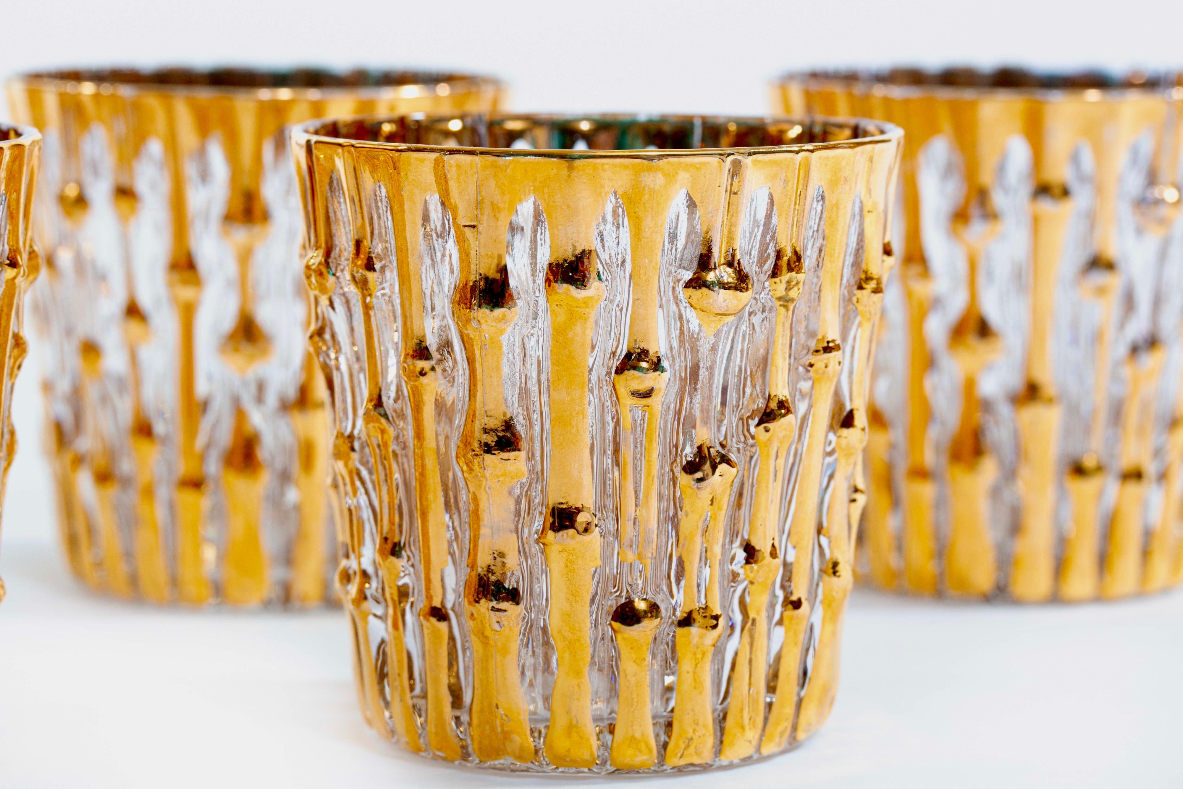 Grab them while they last! And they won't. Rare, and in excellent condition with no gold loss on rims - set of 22-karat gold hand painted bamboo pattern rocks glasses by the Imperial Glass Company. The bamboo pattern is embossed, meaning the glasses