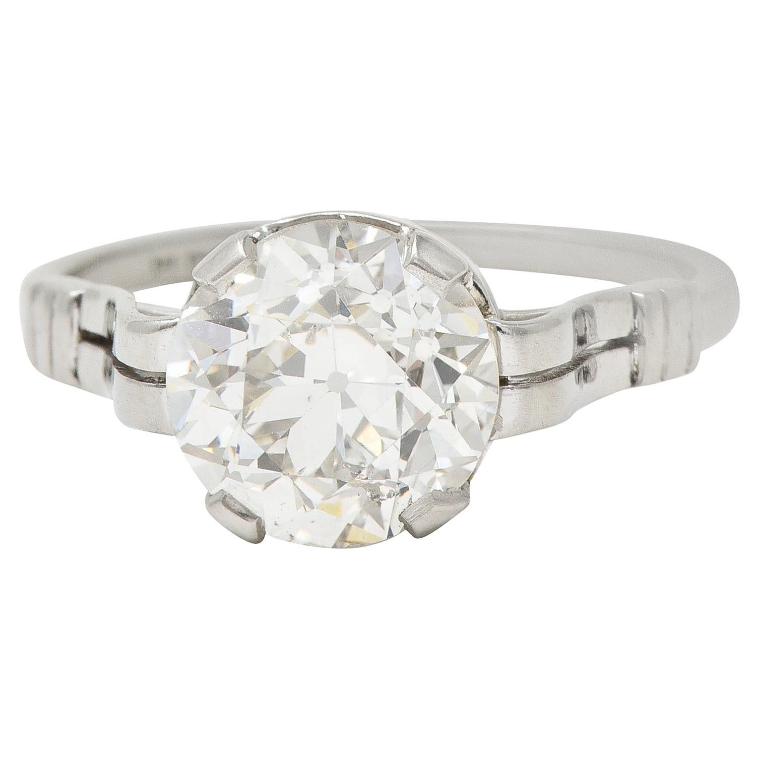 Mid-Century 2.84 CTW Old European Cut Diamond Platinum Ribbon Engagement Ring For Sale