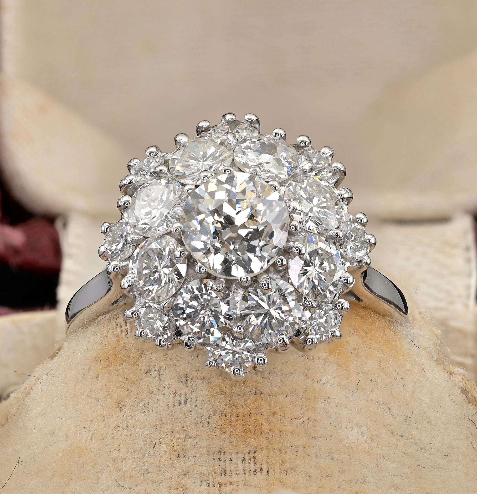 This stunning mid-century ring is 1950 ca.
Italian origin
Mounting artful hand made in a Daisy shape with a lovely old style caged basket work
18 KT solid white gold
Rich Diamond cluster crown  contains as follow:
1 old European cut diamond of