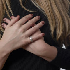 Mid Century 3 carat round and baguette diamond platinum infinity twist band