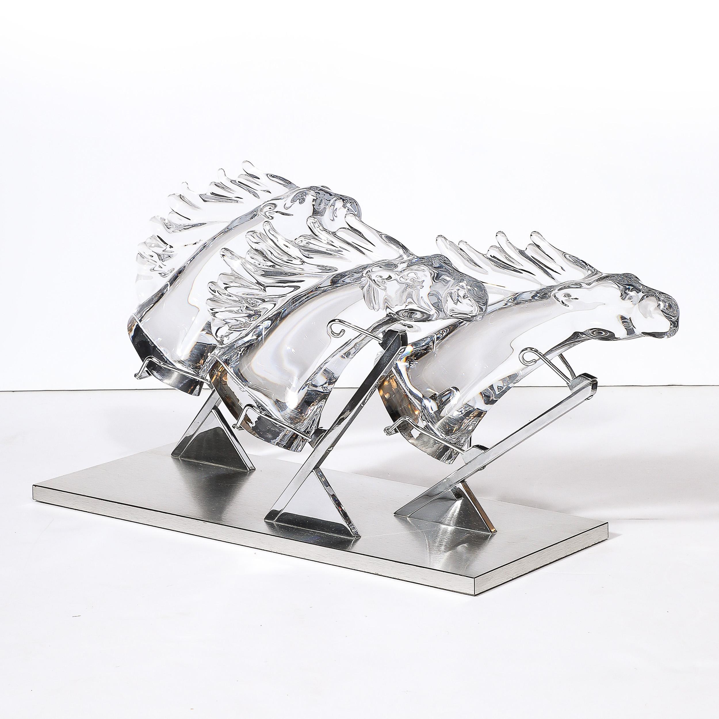This striking and materially exquisite Mid-Century Modernist Three Horse Grand Prix Glass Sculpture on Aluminum Base #165/200 Signed Daum originates from France during the 20th Century. Features a rectilinear polished aluminum base with triangular
