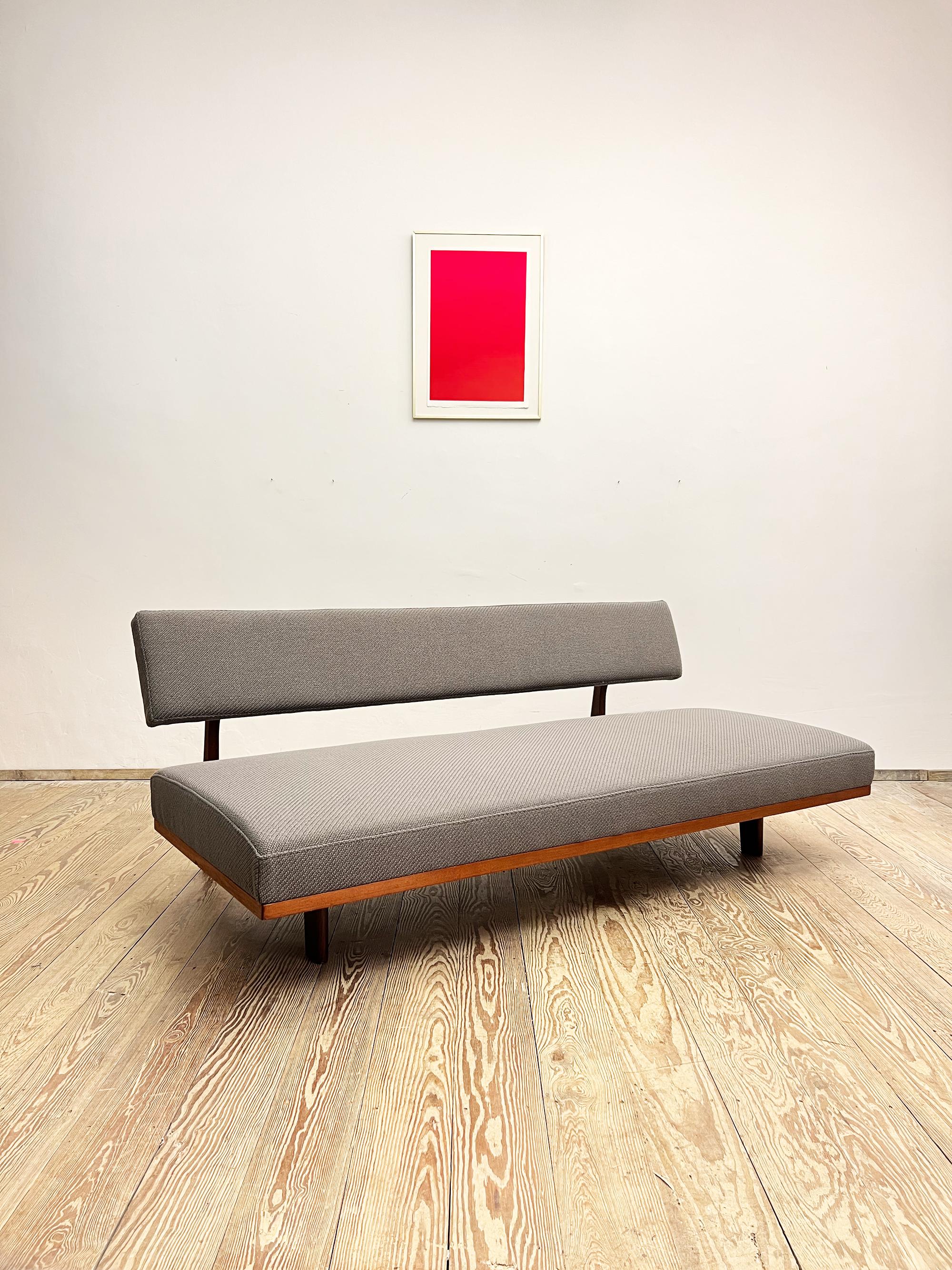 Dimensions 85-102 x 190 x 74  41 cm (Depth x Width x Height / Seat height)

This unique mid-century design sofa/daybed was designed by Hans Bellmann for Wilkhahn, Germany in the 1960s. The sofa comes in a beautiful solid mahogany-colored wood frame