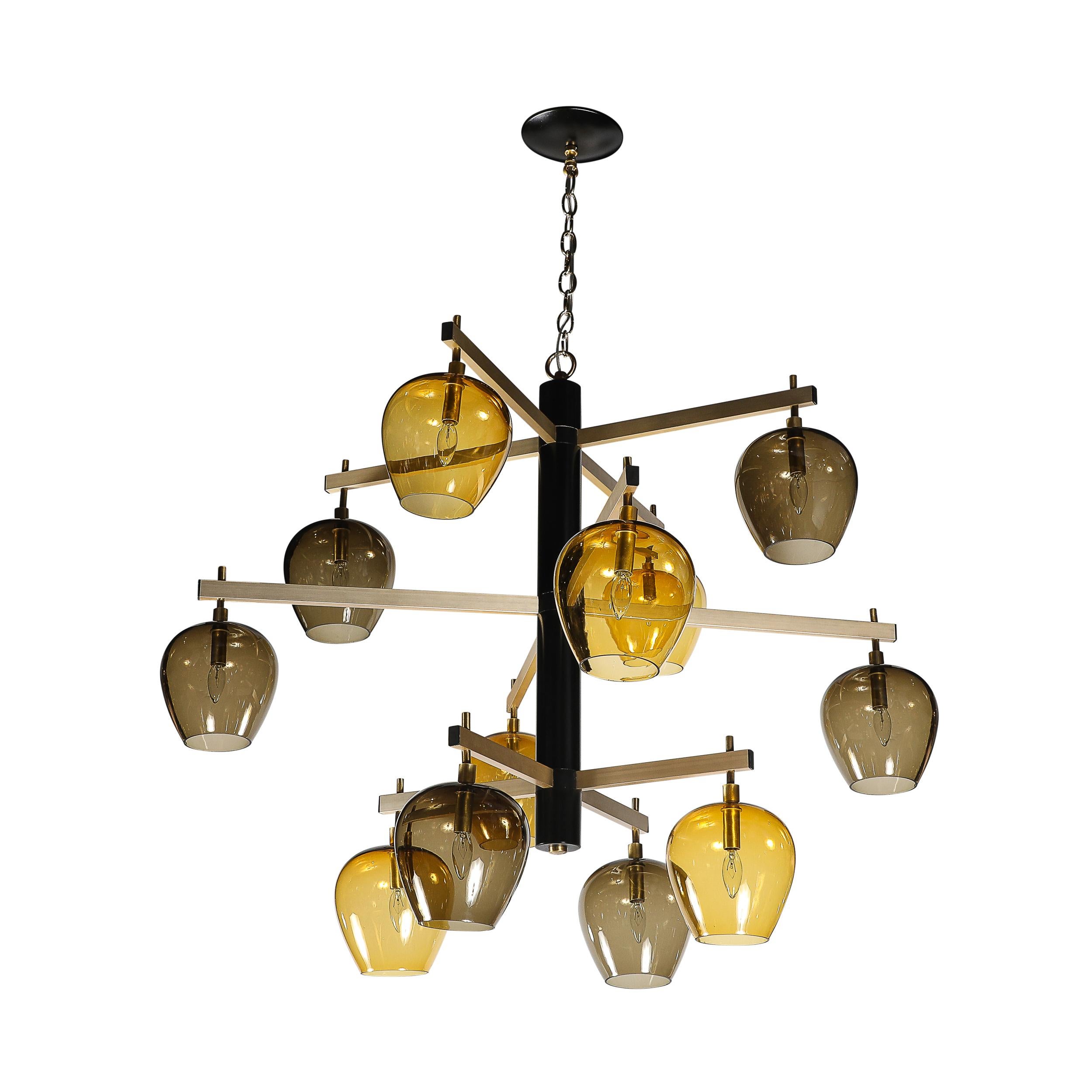 This striking mid-century modernist chandelier is an exquisite example of American design sophistication from the late 20th century, created by the iconic company Lightolier. Dating to circa 1970, this chandelier embodies clean geometric lines and a