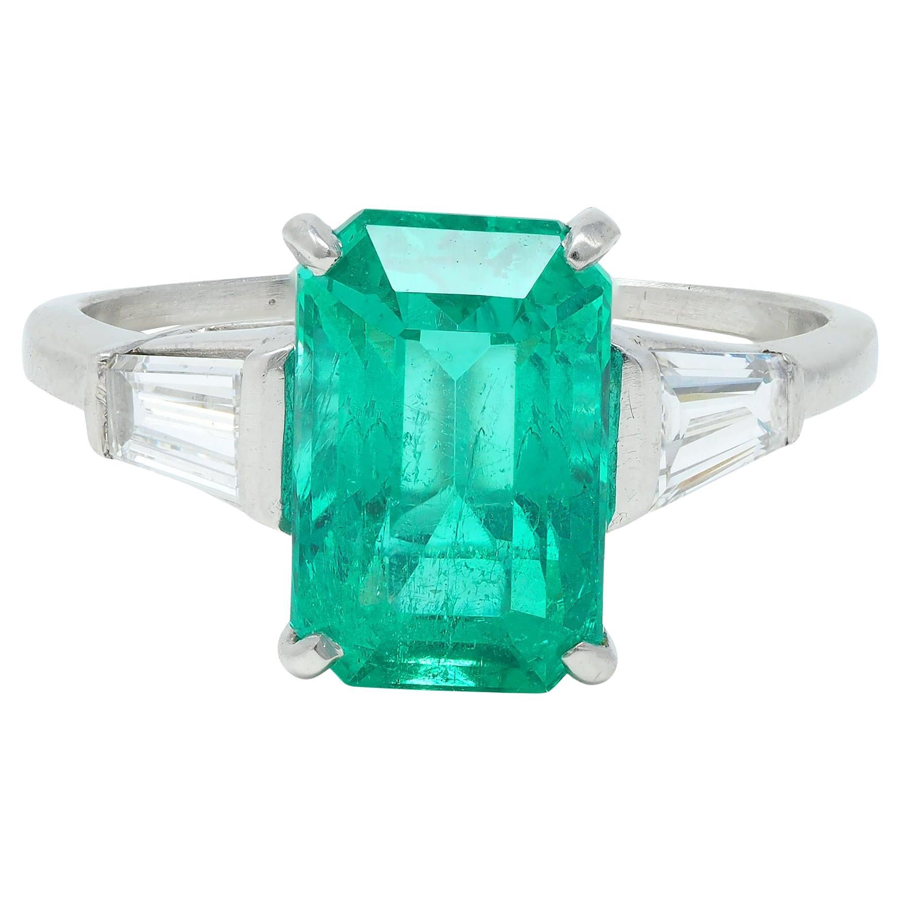 Mid-Century 3.43 CTW Colombian Emerald Diamond Platinum Three Stone Vintage Ring For Sale