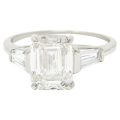 Vintage Mid-Century 3.60 Carats Emerald Cut Diamond Platinum Three Stone Engagement Ring