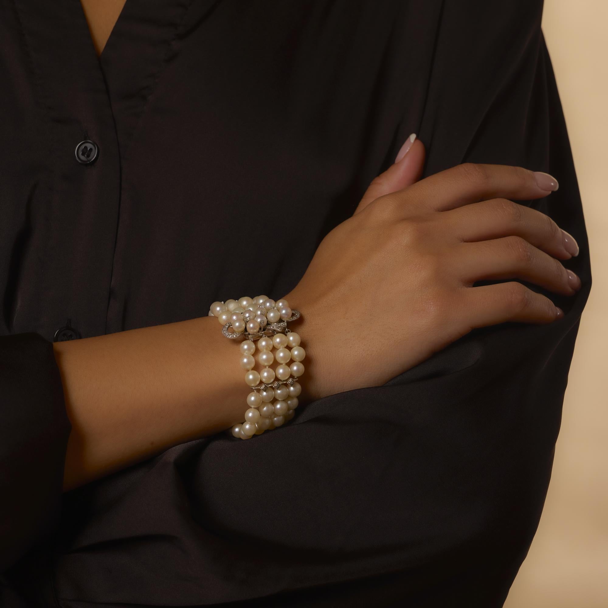 This elegant 1960’s bracelet features luminous pearls paired with sparkling single cut diamonds in richly polished 14k white gold for a graceful and timeless statement.