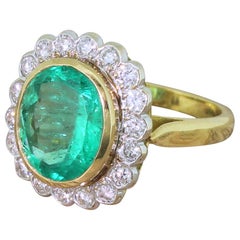 Vintage Midcentury 4.17 Carat Colombian Emerald and Diamond Cluster Ring