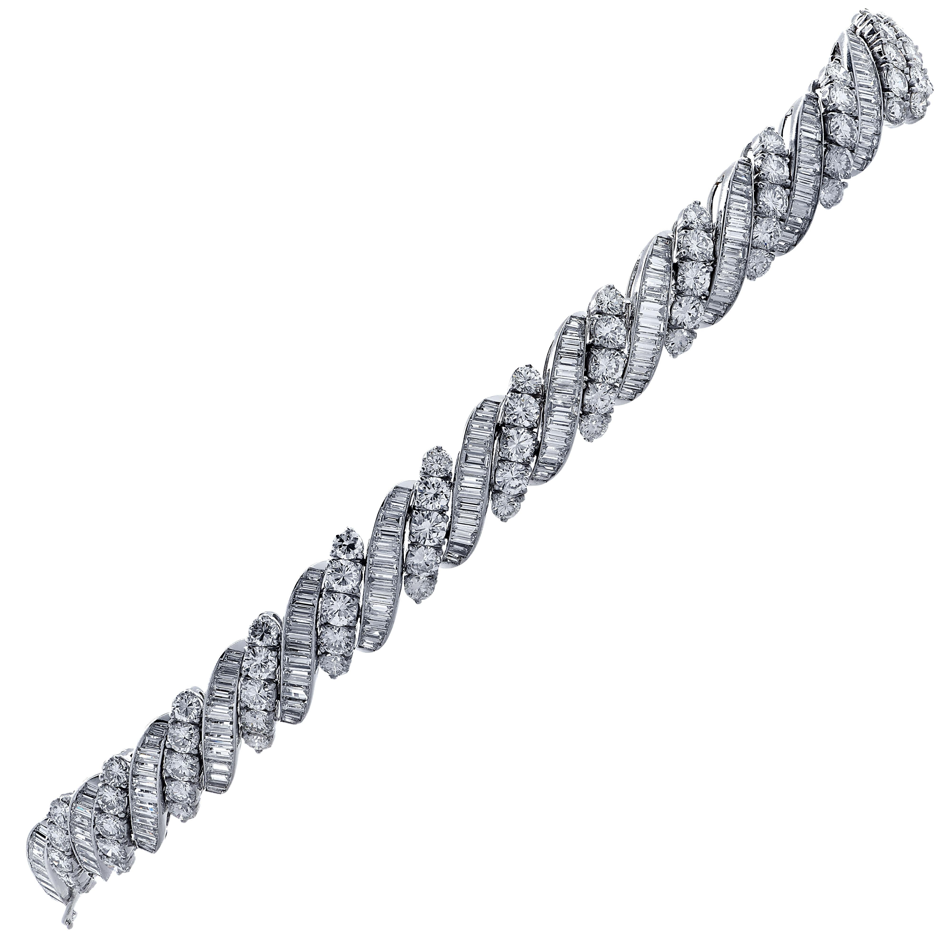 Sensational bracelet set, finely crafted in platinum, Each bracelet  showcasing 130 round brilliant cut diamonds weighing approximately 17.30 carats total, F color, VS clarity, and 288 baguette cut diamonds weighing approximately 24.70 carats total,