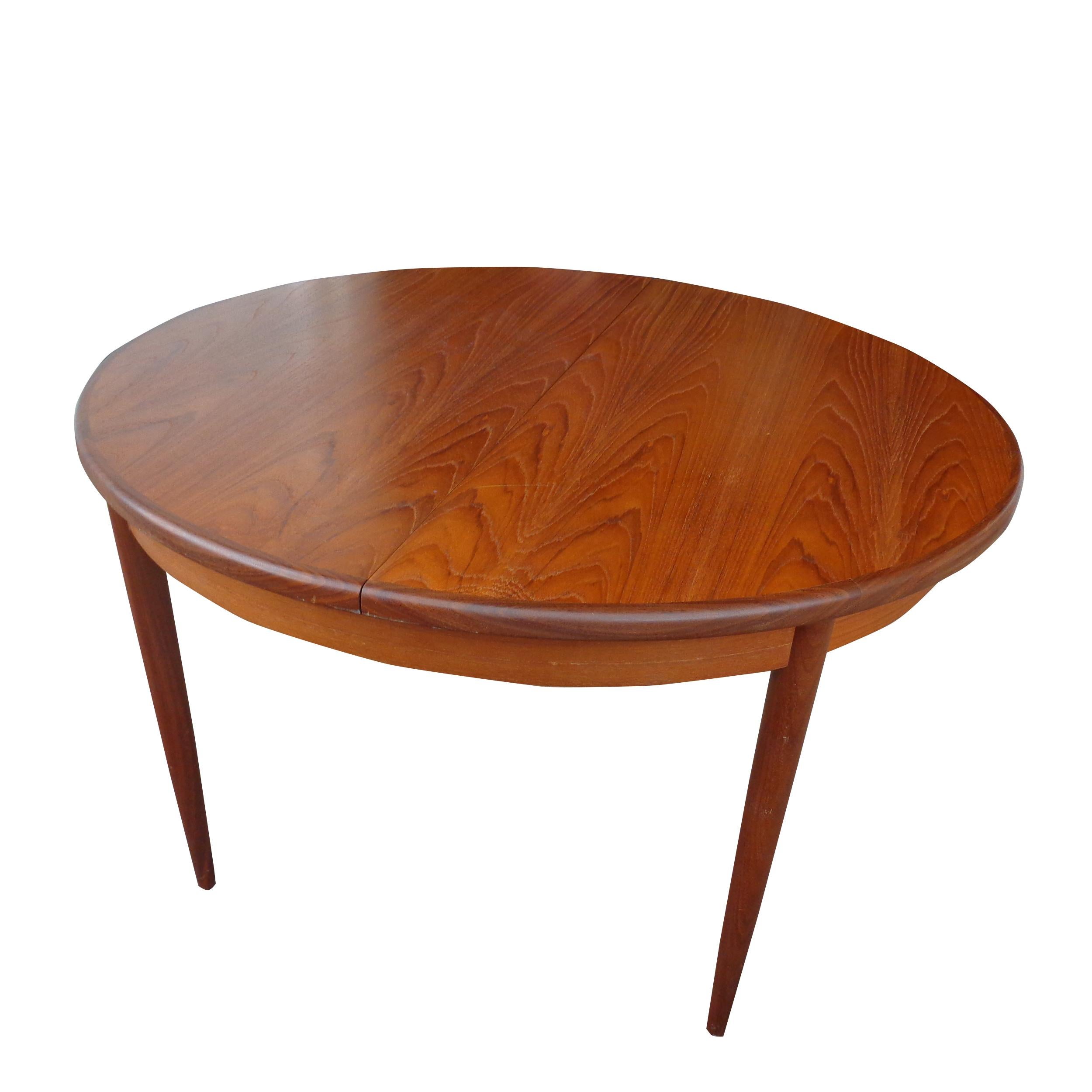 G Plan teak dining table

Mid-Century Modern G Plan round 48