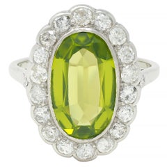 Mid-Century 5.35 CTW Peridot Diamond Platinum 14K White Gold Vintage Halo Ring (Bague Halo Vintage en or blanc)