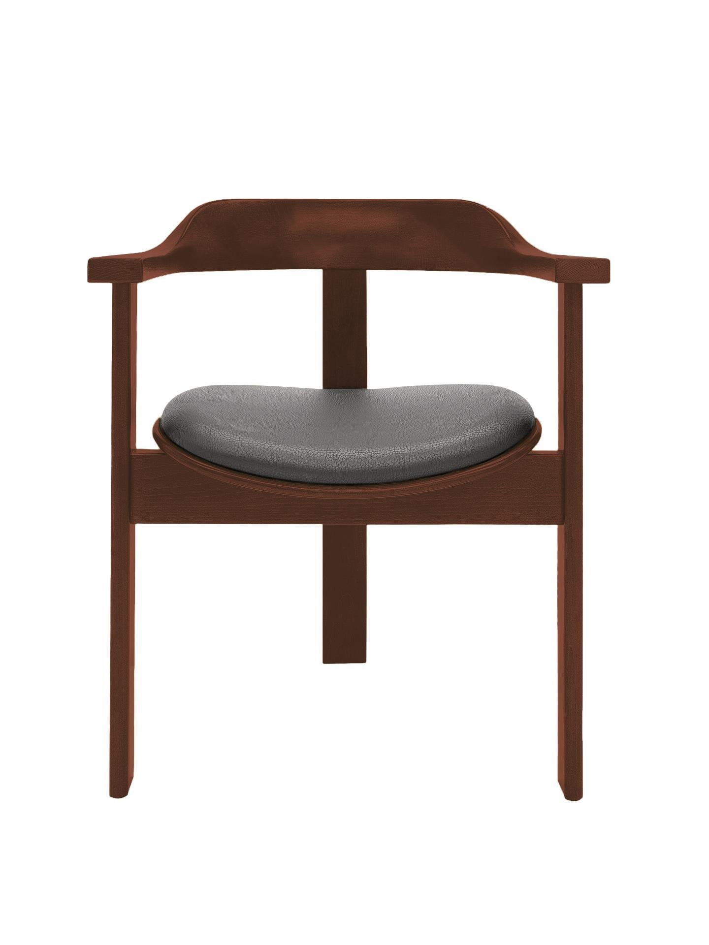 La silla Haussmann es una vibrante pieza atemporal de confort y elegancia.

Esta singular silla de tres patas se estrenó en la 