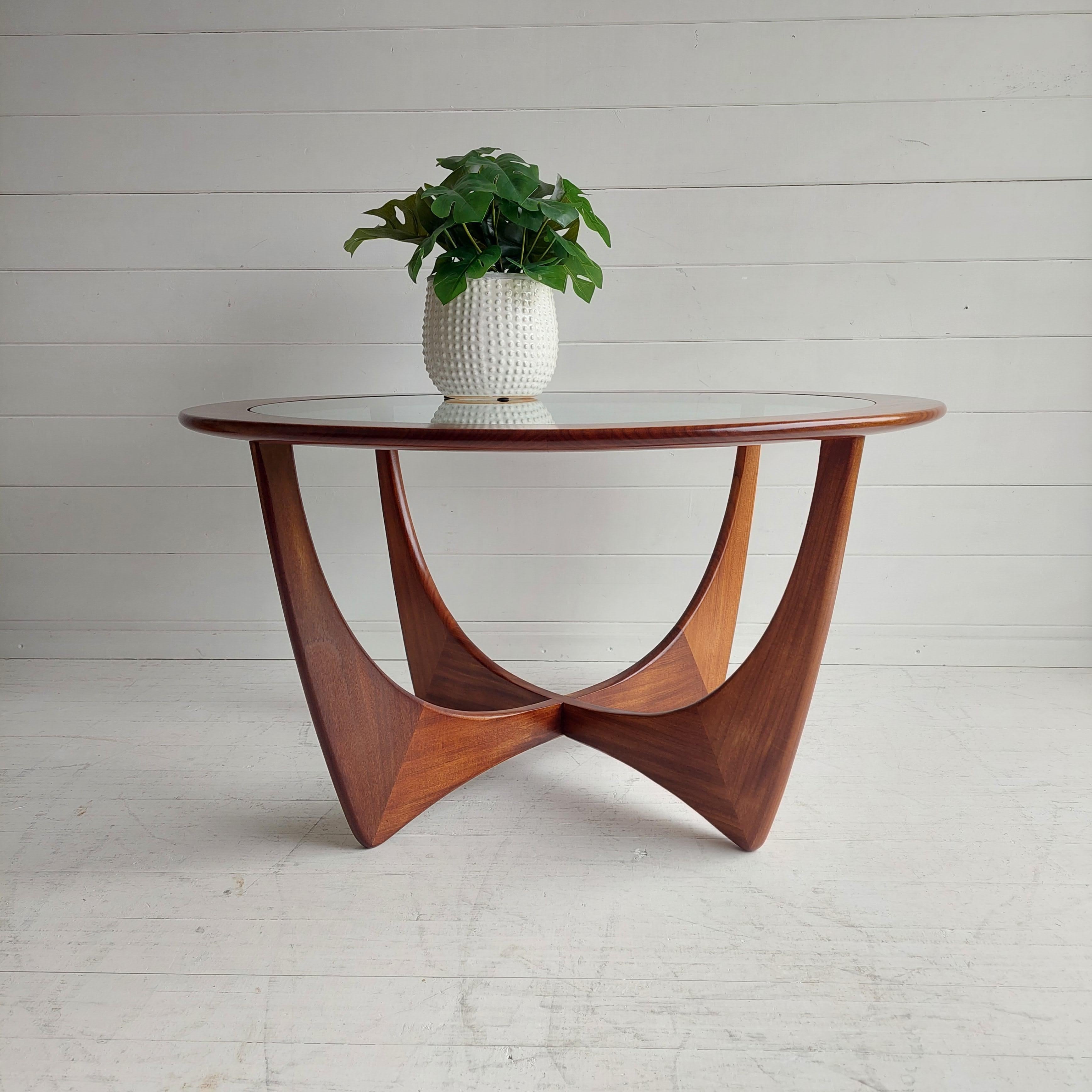 G Plan astro style teak and glass round coffee table dating from the 1960s or 1970s.
Teak Afrormosia G Plan circular coffee table designed by Victor Wilkins designed circa 1969. 
Often referred to as the Astro coffee table this is such a shapely