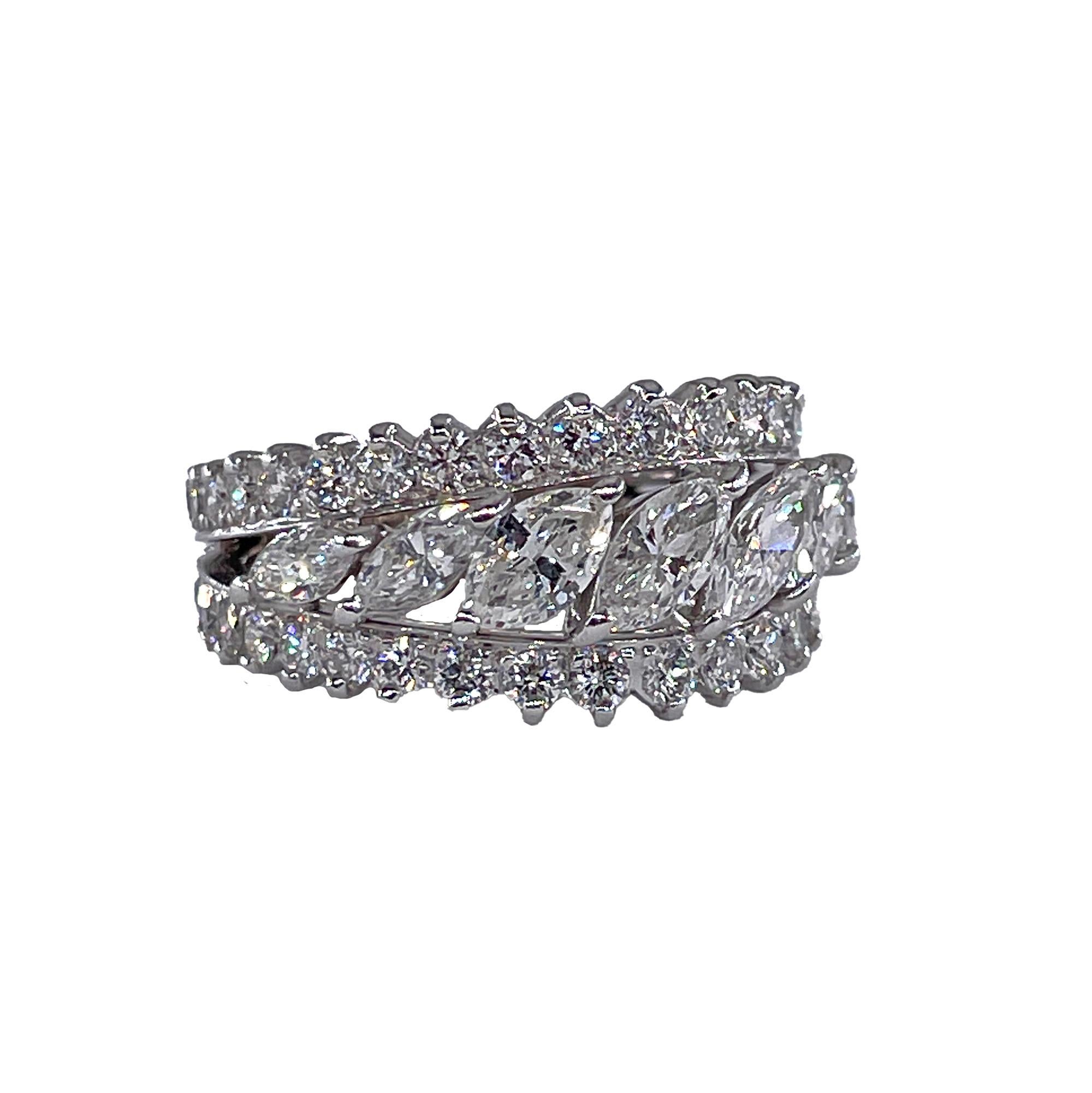 Vintage 6.89ctw Marquise Round Natural Diamond  Eternity Band Engagement Wedding Platinum Ring, Circa 1960s

Step into the 60s Glamour and away from the traditional eternity band style. This dramatic and dynamic, uniquely Fabulous Mid-Century