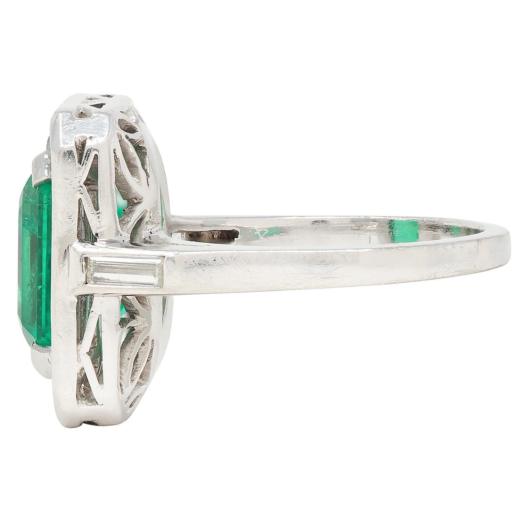Women's Mid-Century 7.00 CTW Colombian Emerald Diamond Platinum Vintage Halo Ring GIA For Sale