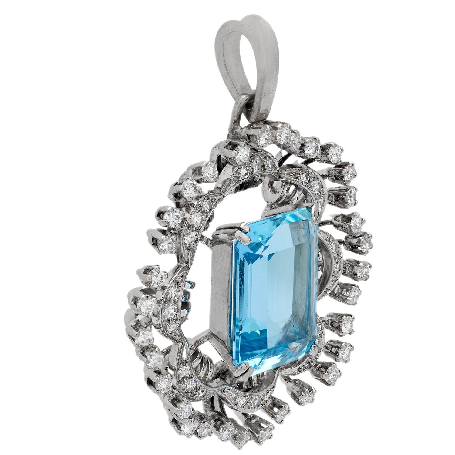 This elegant Mid Century pendant from the 1950s features a richly colored emerald cut aquamarine weighing approximately 9.20 carats. Surrounding the center stone are 56 round brilliant and single cut diamonds totaling approximately 1.65 carats,