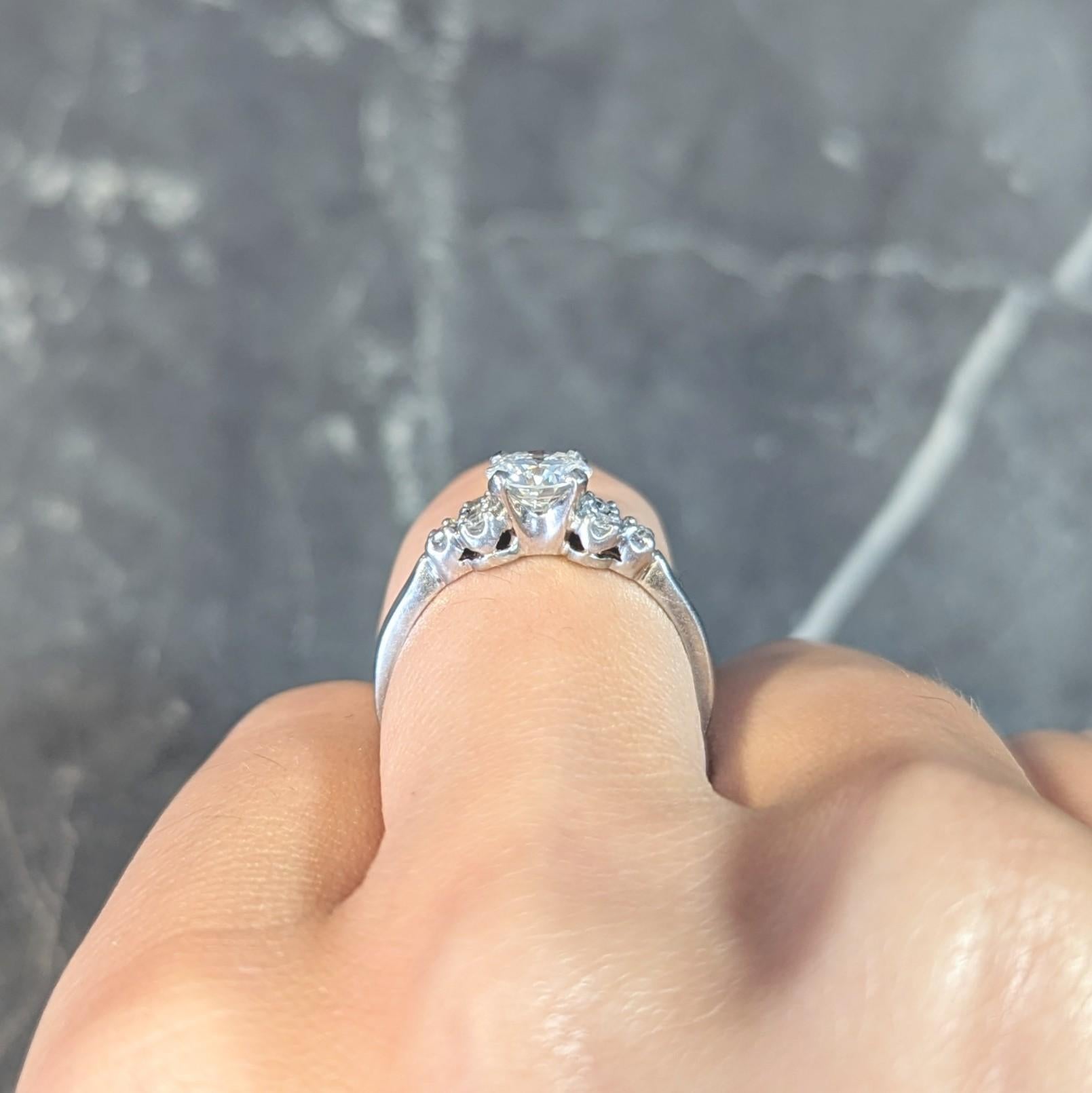 Mid-Century .95 CTW Diamond 18 Karat White Gold Fishtail Vintage Engagement Ring For Sale 9