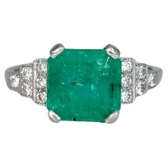 Anillo de compromiso de platino 950 de mediados de siglo con esmeralda de 2,50 quilates y diamante de 0,18 quilates