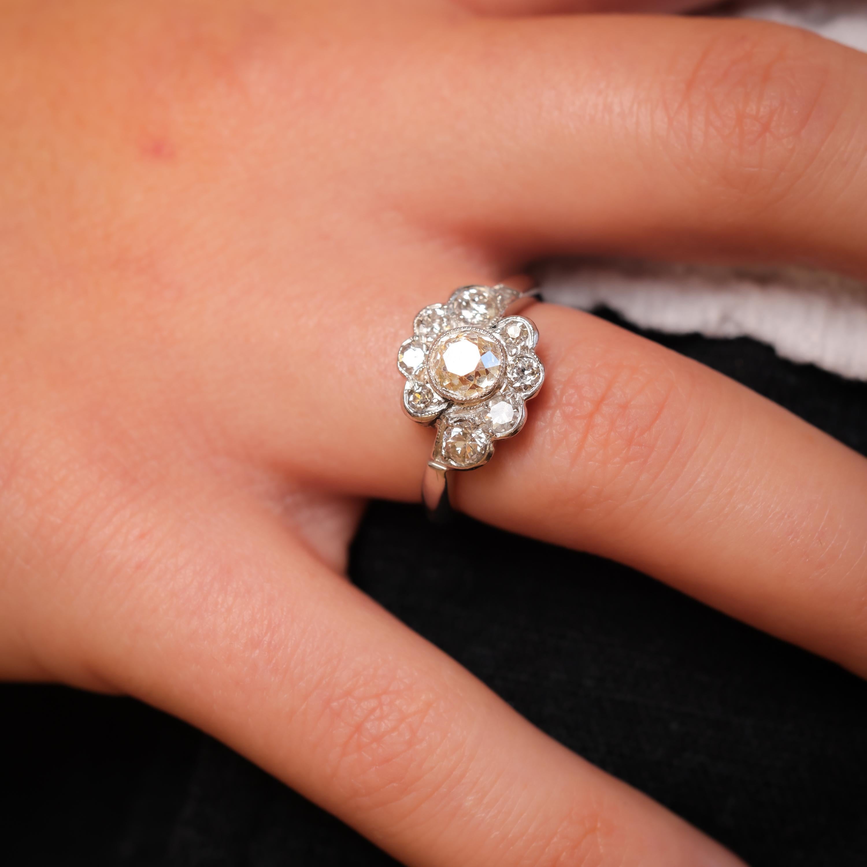 Old Mine Cut Mid Century .99 carat diamond platinum flower cluster ring For Sale