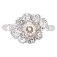 Mid Century .99 carat diamond platinum flower cluster ring