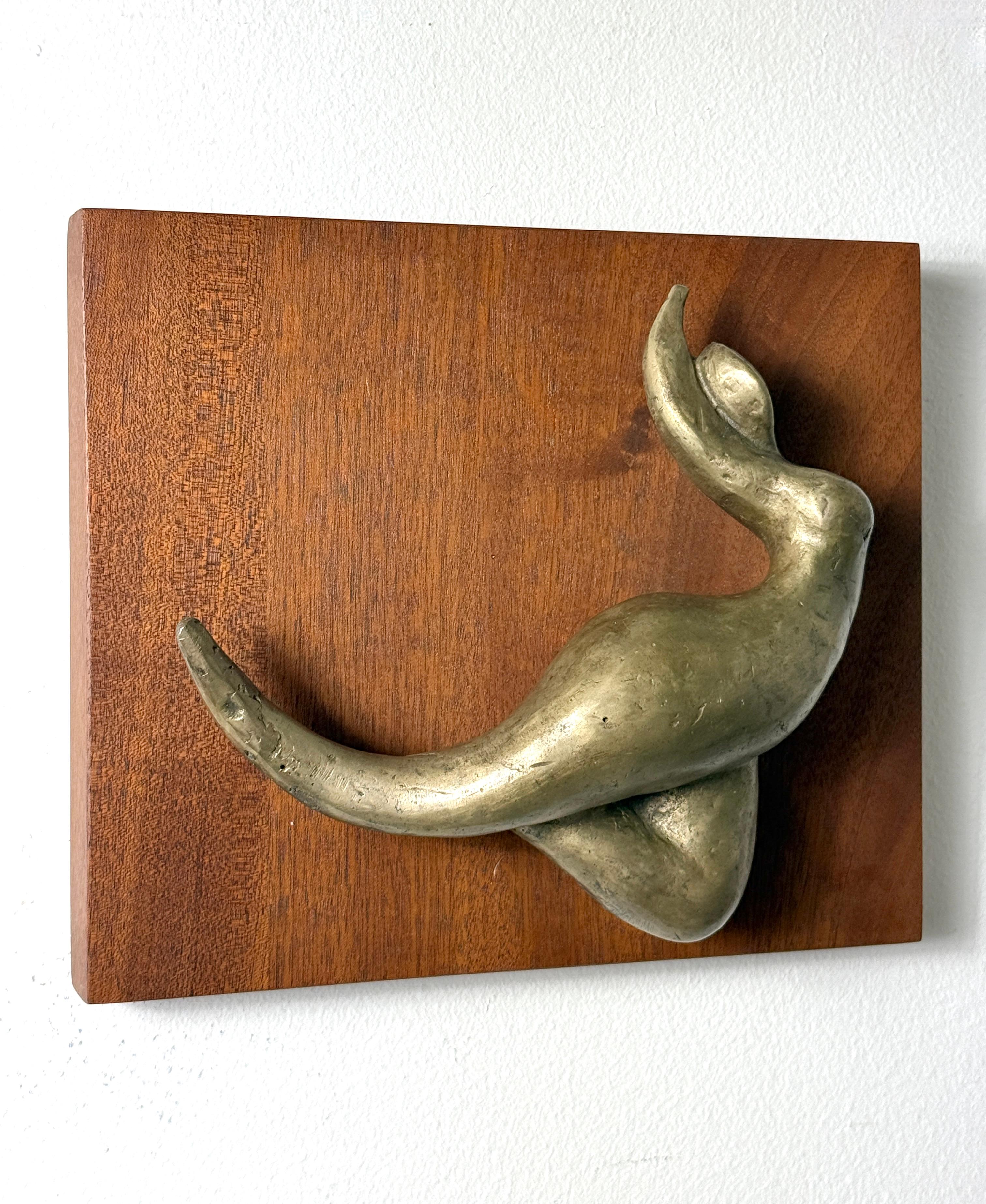 Escultura única de bronce para colgar en la pared, obra de Dennis Barraclough, alrededor de 1970

Una figura biomórfica abstracta de bronce macizo 