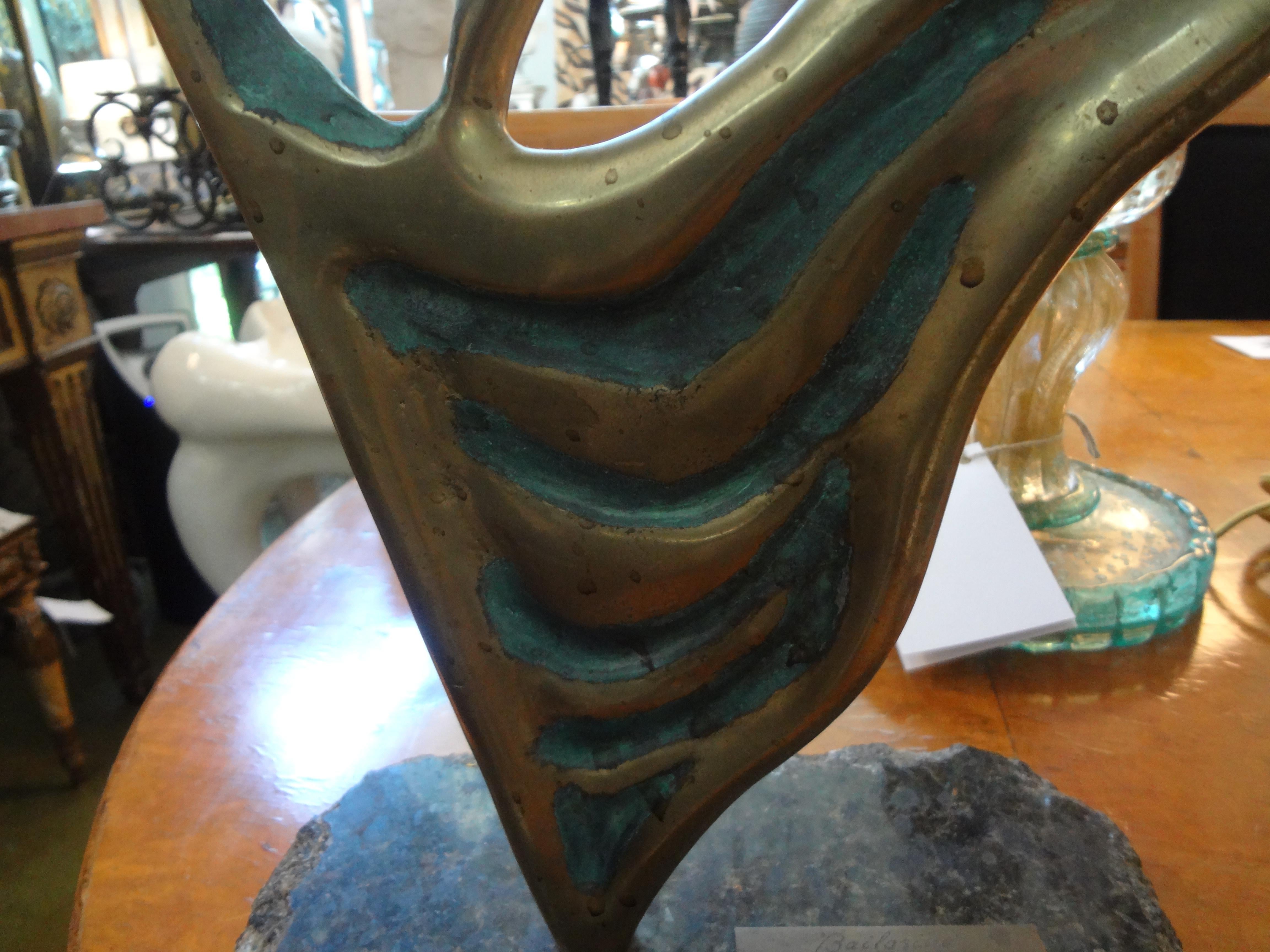 Stunning Mid-Century Modern abstract bronze sculpture on a granite base by Yone Di Alerigi. This bronze sculpture has a plaque with the title, ballerina or ballet dancer and is artist-signed Yone Di Alerigi. Beautiful as a tabletop sculpture or in a