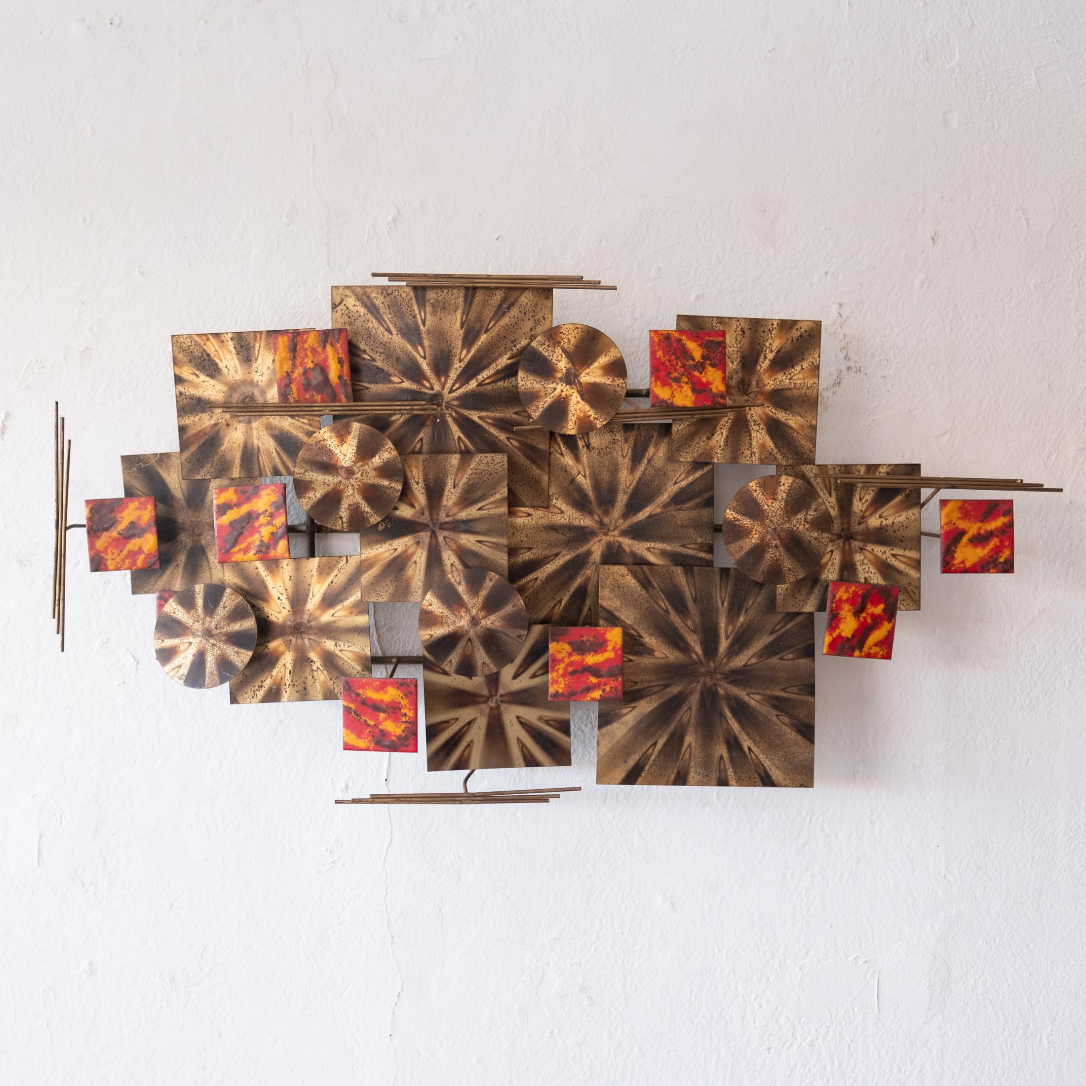Incredible Mid-Century hand crafted wall-mounted sculpture with enamel on metal elements. Would look great over a fireplace. Can be mounted horizontal or vertically.   
