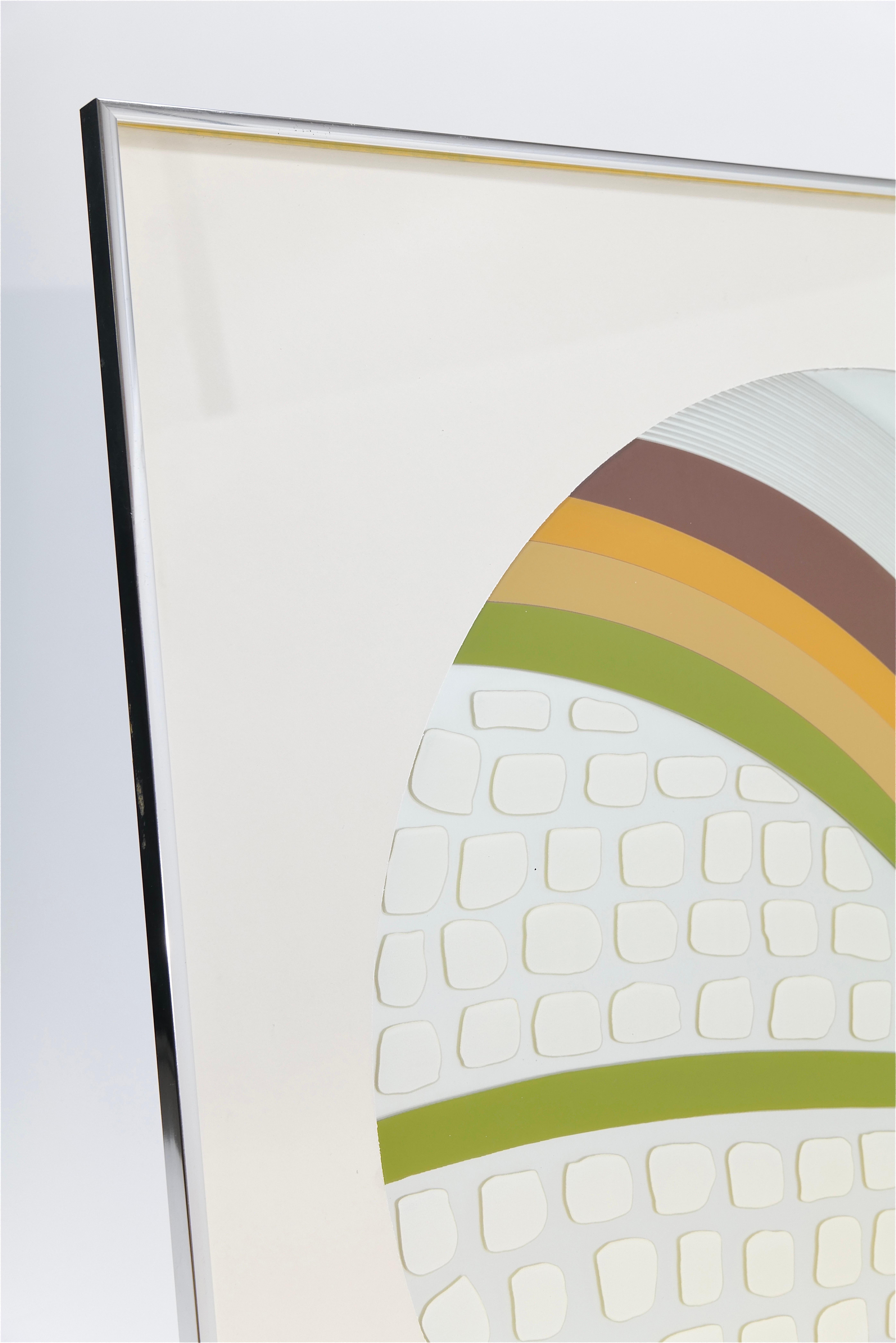 This unique piece of Mid Century wall art features a round mirror set within a sleek chrome metal frame, exuding a modern, minimalist appeal. Measuring 30.25”x30.5”. The mirror itself is artistically embellished with geometric shapes painted in