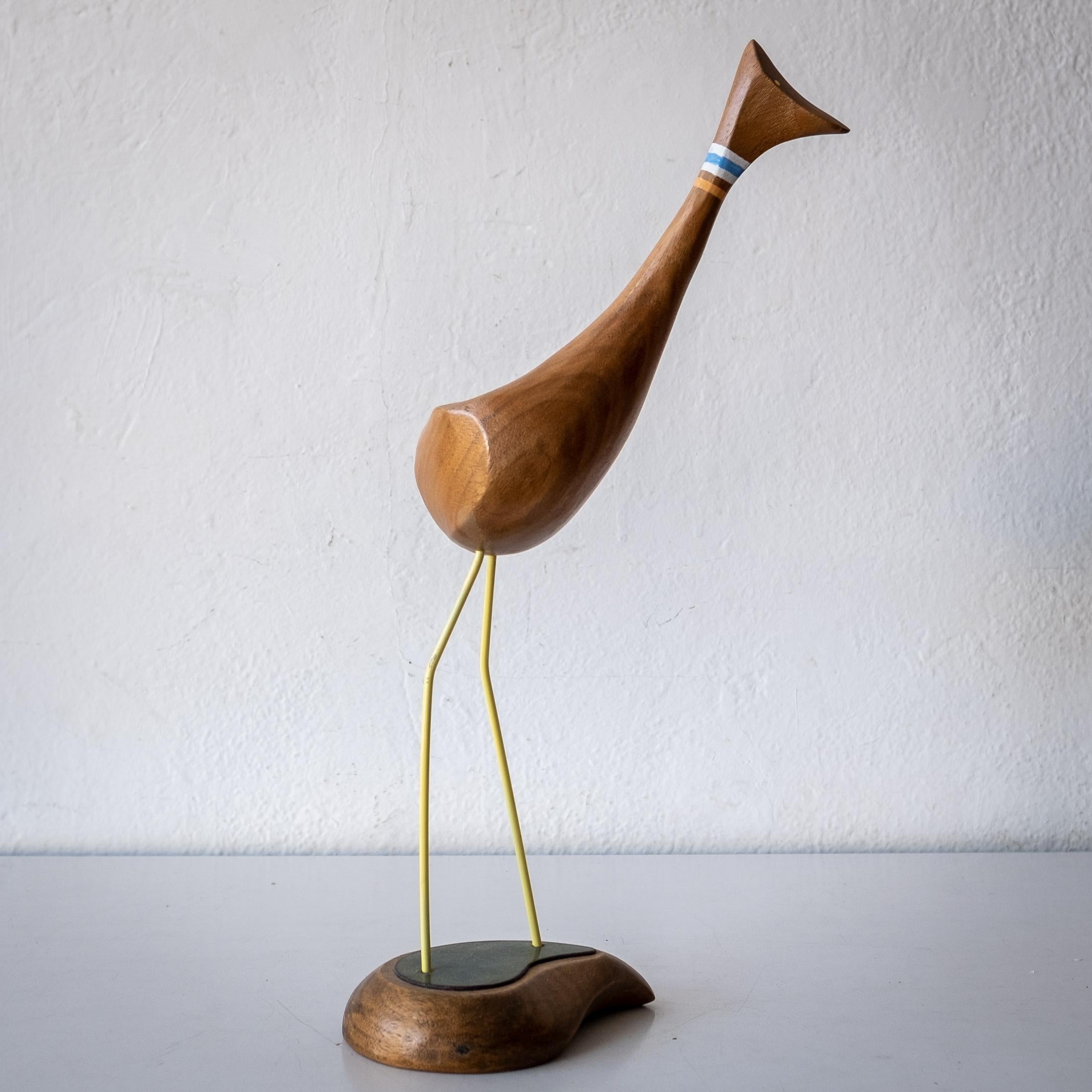Abstract bird sculpture by artist Val Robbins (1925-2009). Executed at his Rimrock Pennsylvania studio. Wood form on metal legs. The enamel is by his wife Mae Robbins. This was purchased directly from the artist's estate. Signed on the base. USA,