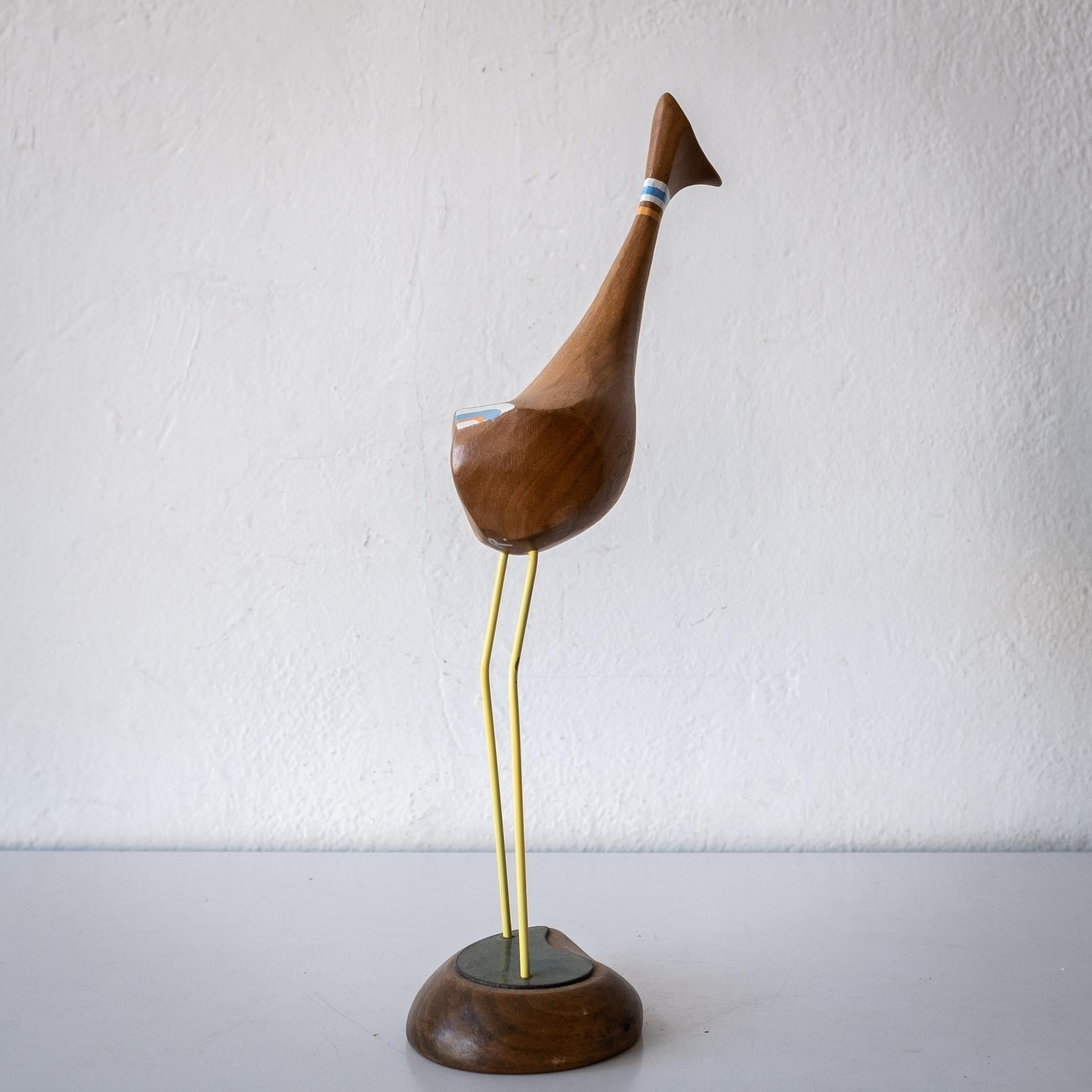 wooden bird sculpture