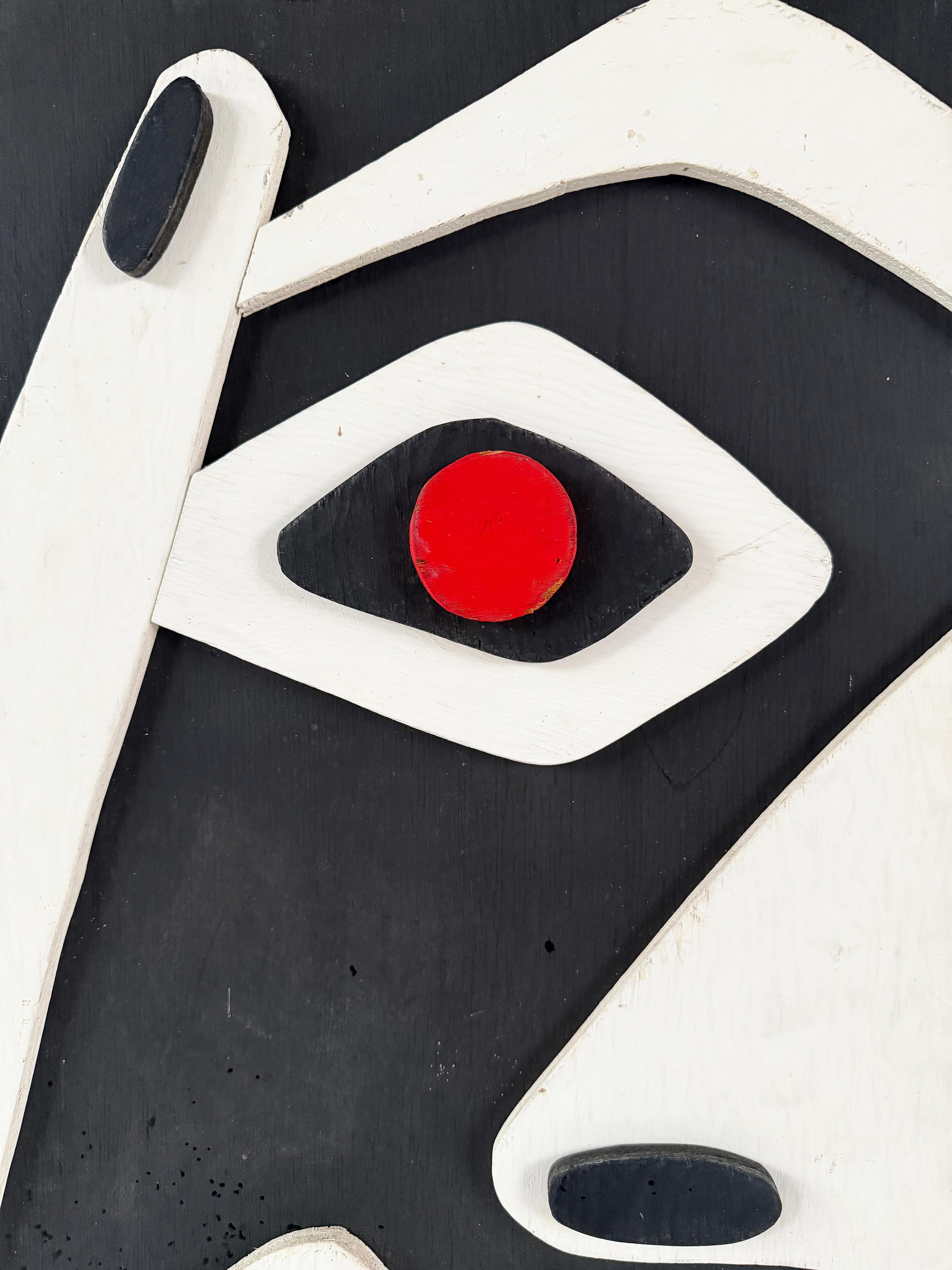 Mid-century  Abstract Wood Relief Wall Sculpture Picasso Inspired

Offered for sale is a hand crafted wooden relief wall sculpture created with levels of wood that have been cut an painted. The graphic figure is inspired by Picasso and rustically