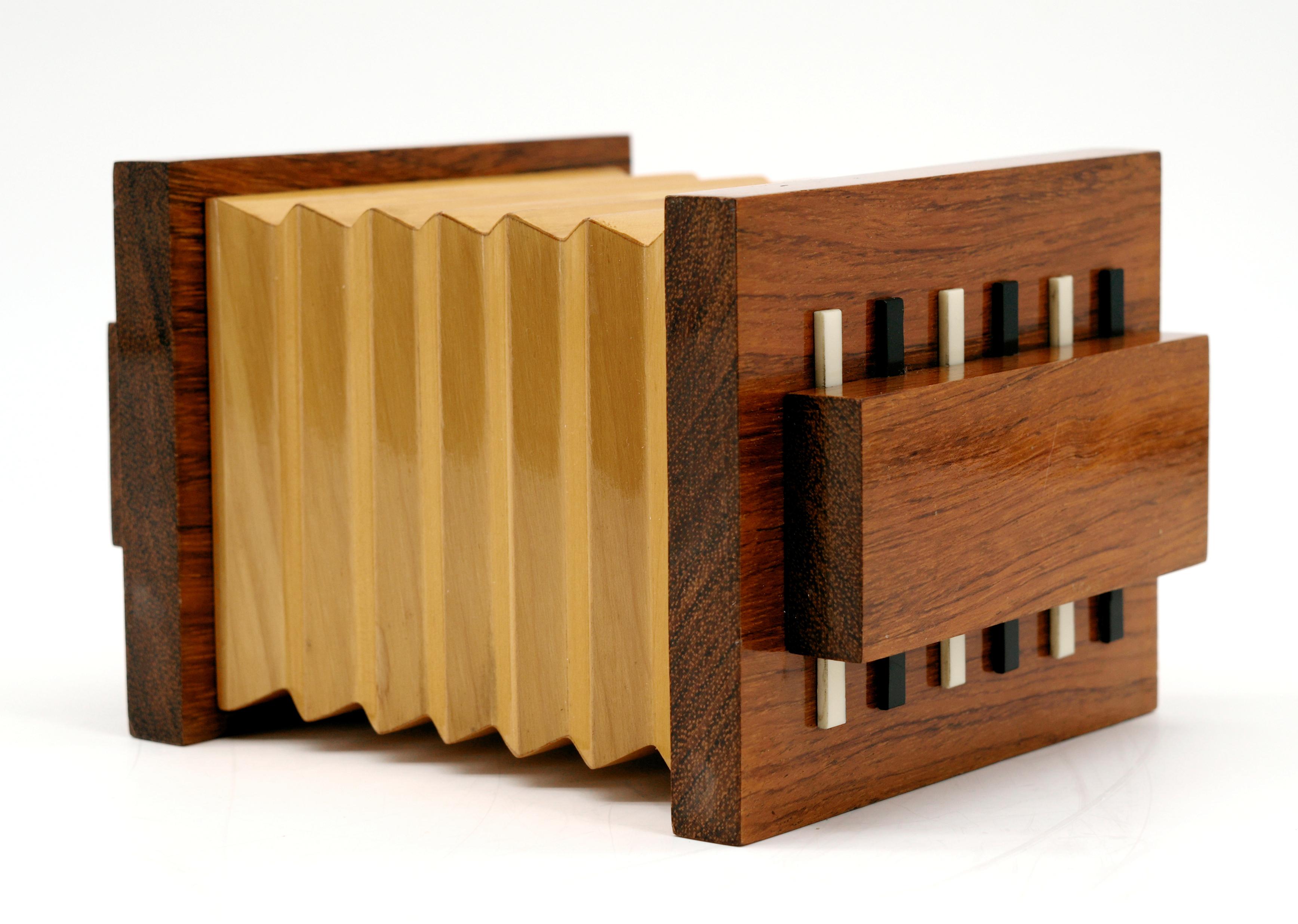 Mid-century accordion cigarette box, France, 1950's. Noble woods & bakelite. Measures: height: 5.3