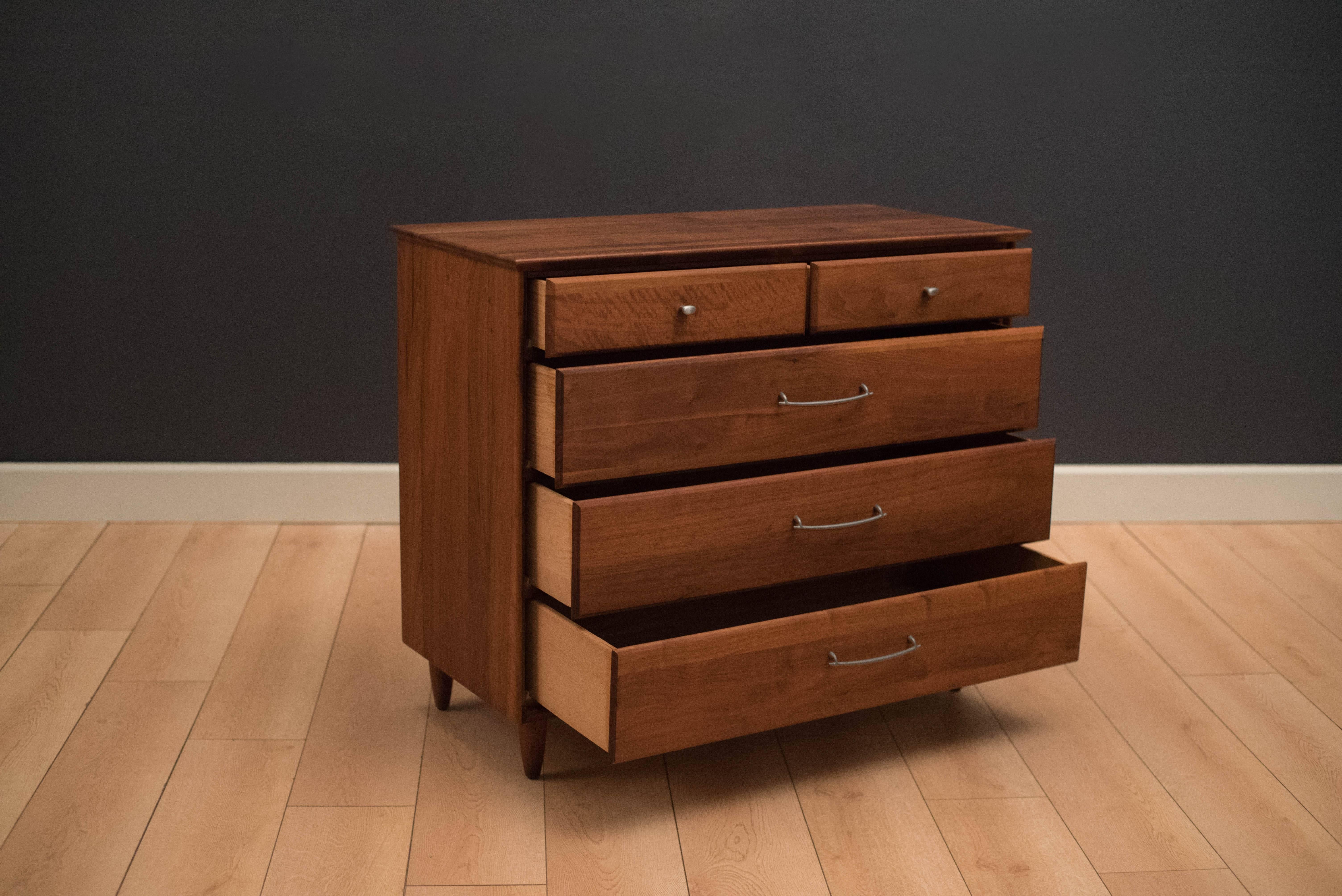 Mid-century prelude dresser chest for Ace-Hi Furniture in solid planked walnut. This piece includes five spacious drawers with the original pewter pulls.